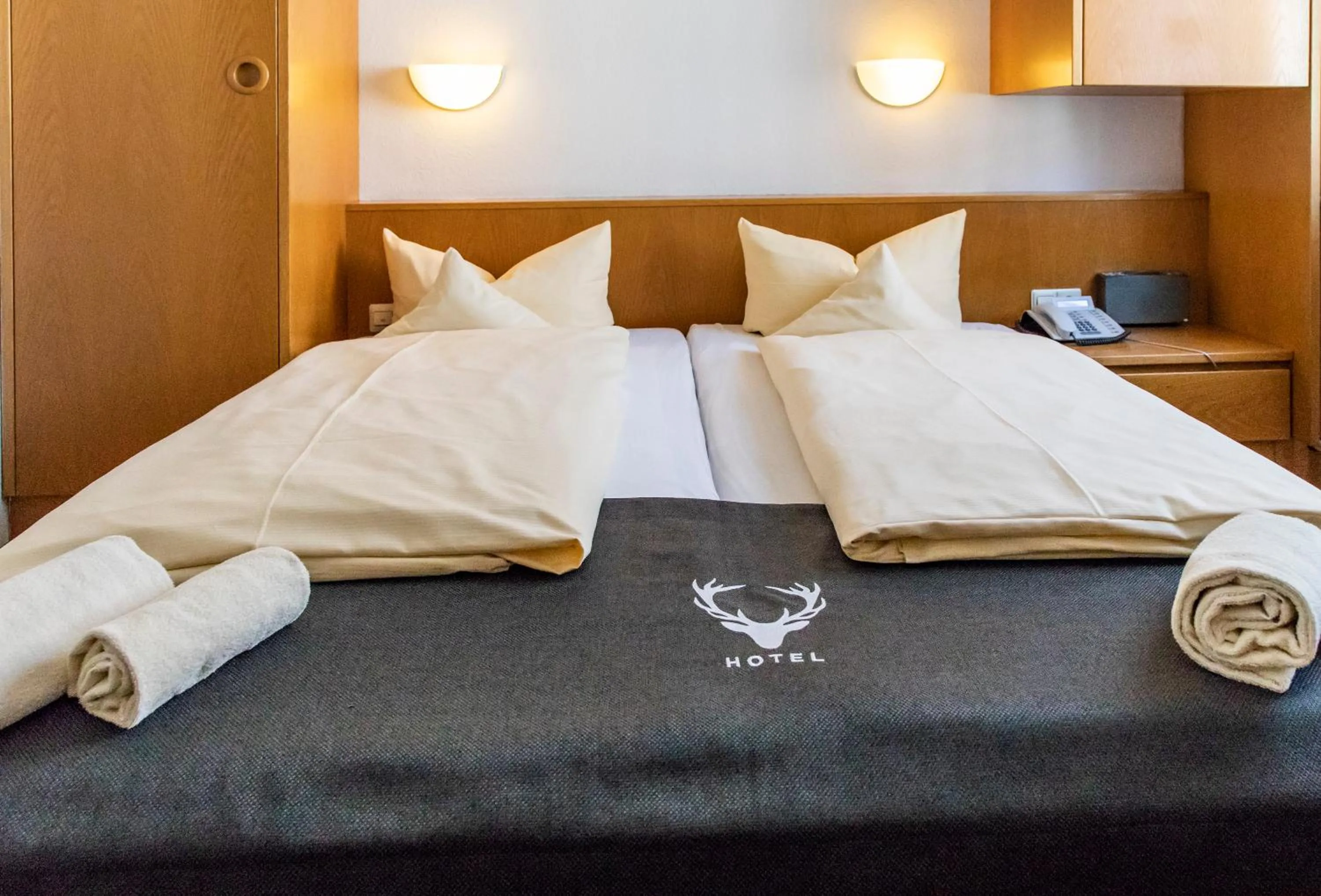 Photo of the whole room, Bed in Hotel JÄGERHAUS in Singen am Hohentwiel