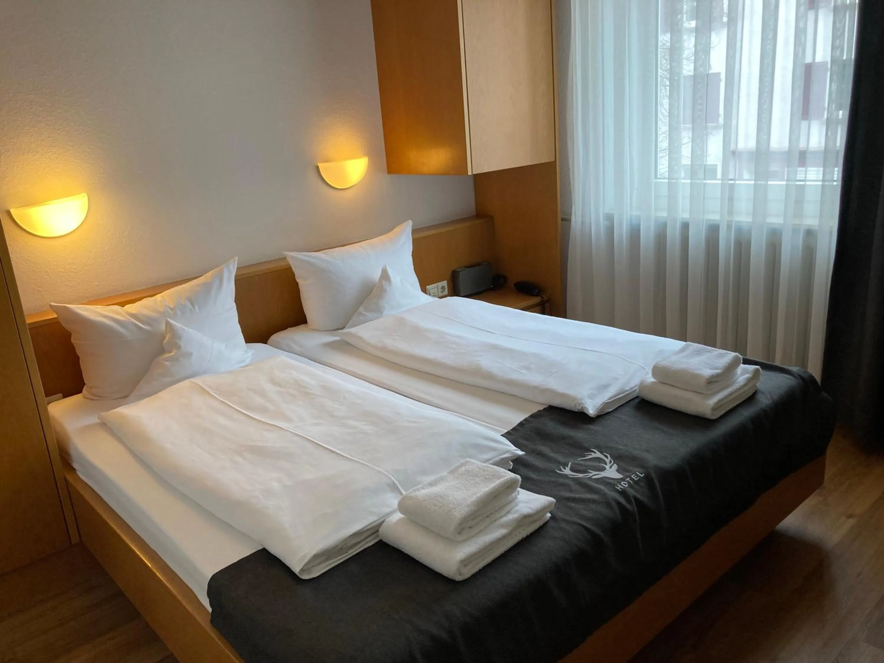 Bedroom, Bed in Hotel JÄGERHAUS in Singen am Hohentwiel