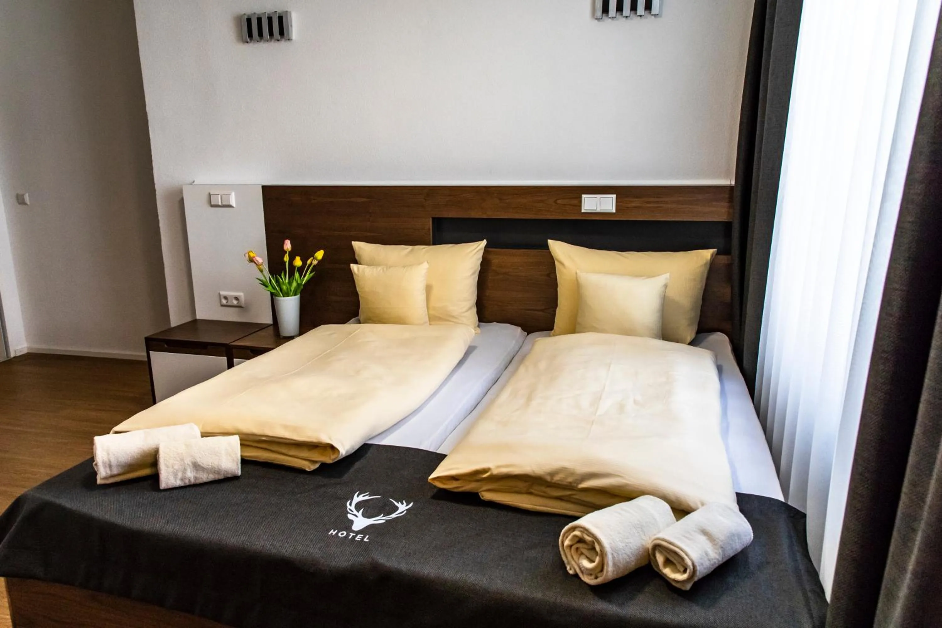 Photo of the whole room, Bed in Hotel JÄGERHAUS in Singen am Hohentwiel