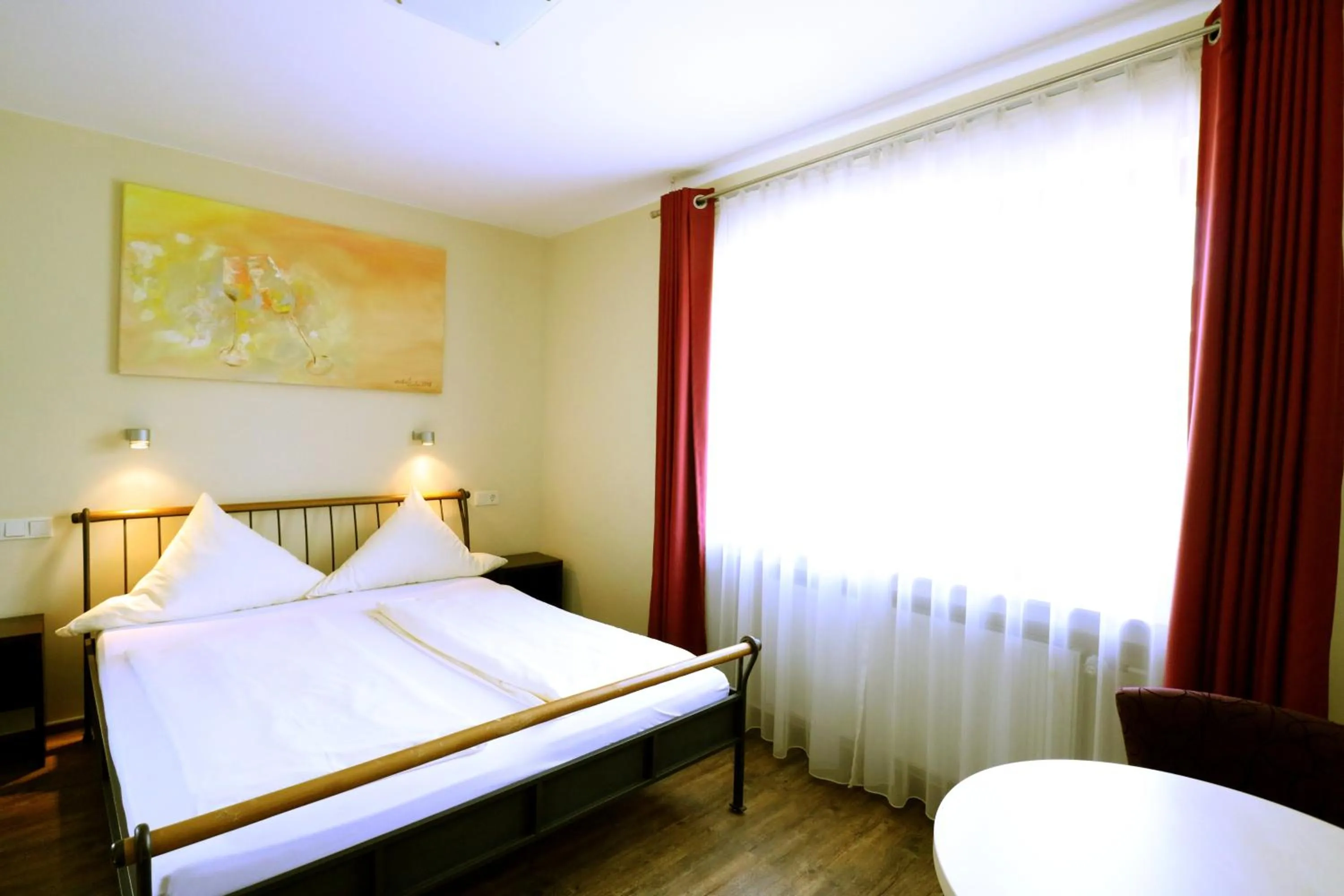 Photo of the whole room, Bed in Christiana's Wein & Art Hotel