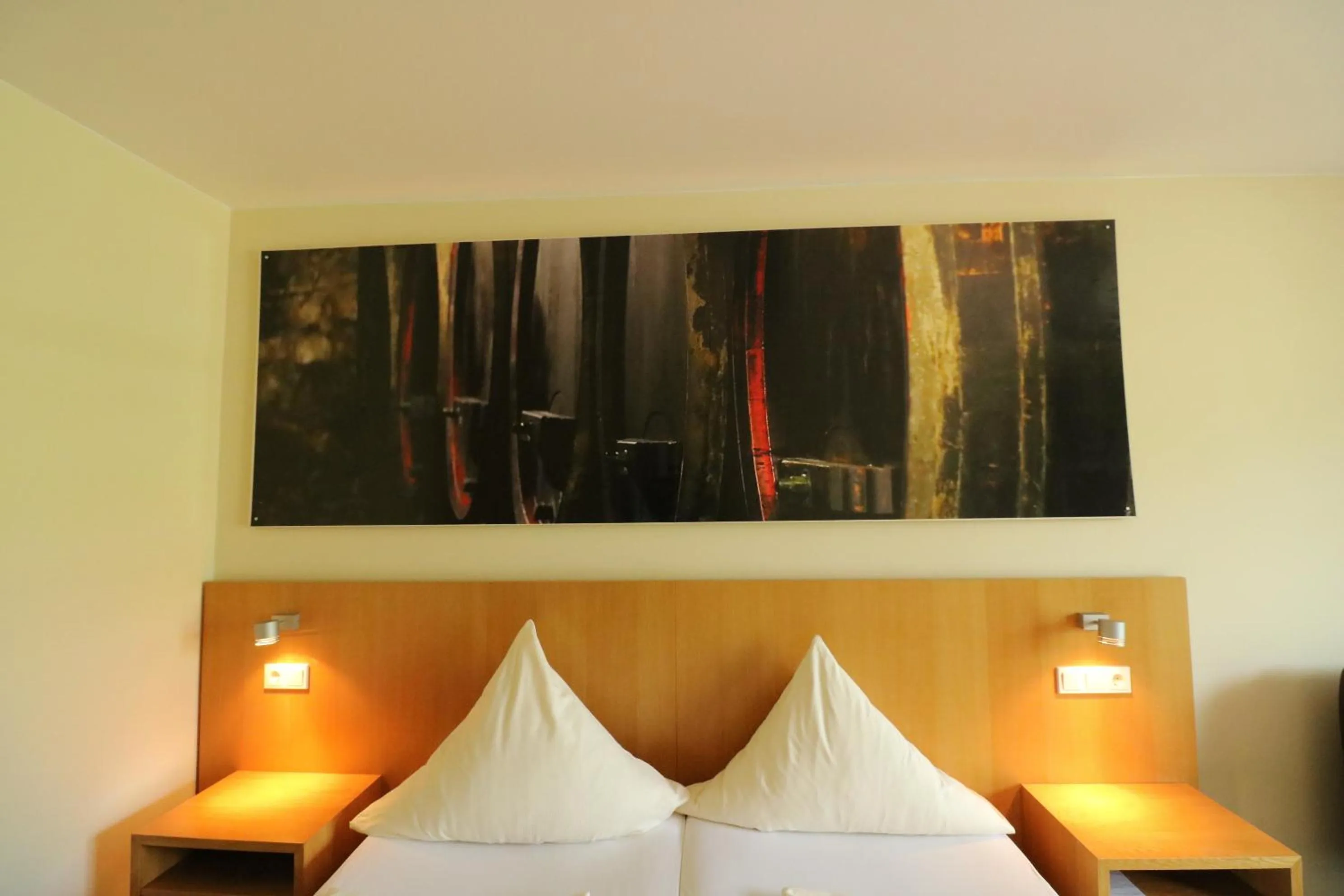 Decorative detail, Bed in Christiana's Wein & Art Hotel