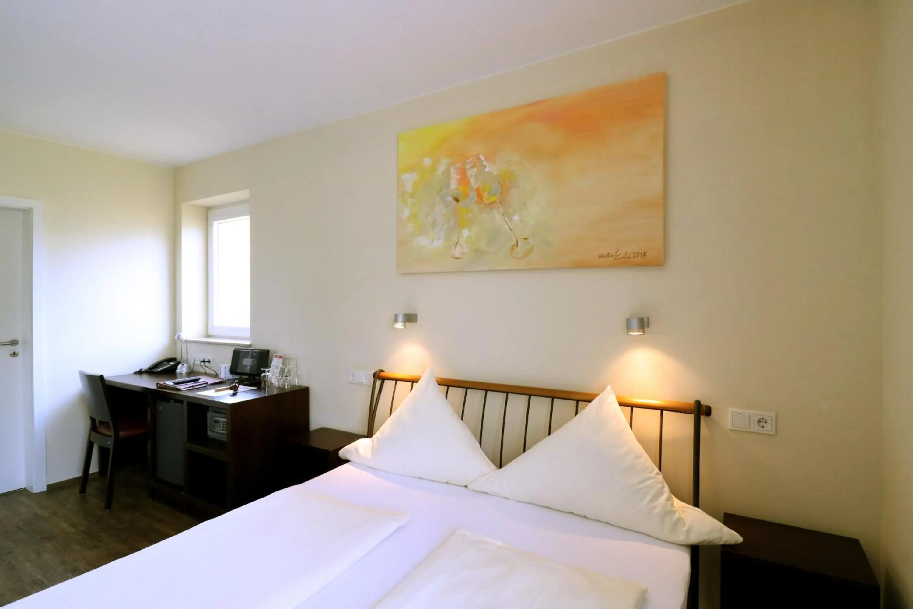 Photo of the whole room, Bed in Christiana's Wein & Art Hotel