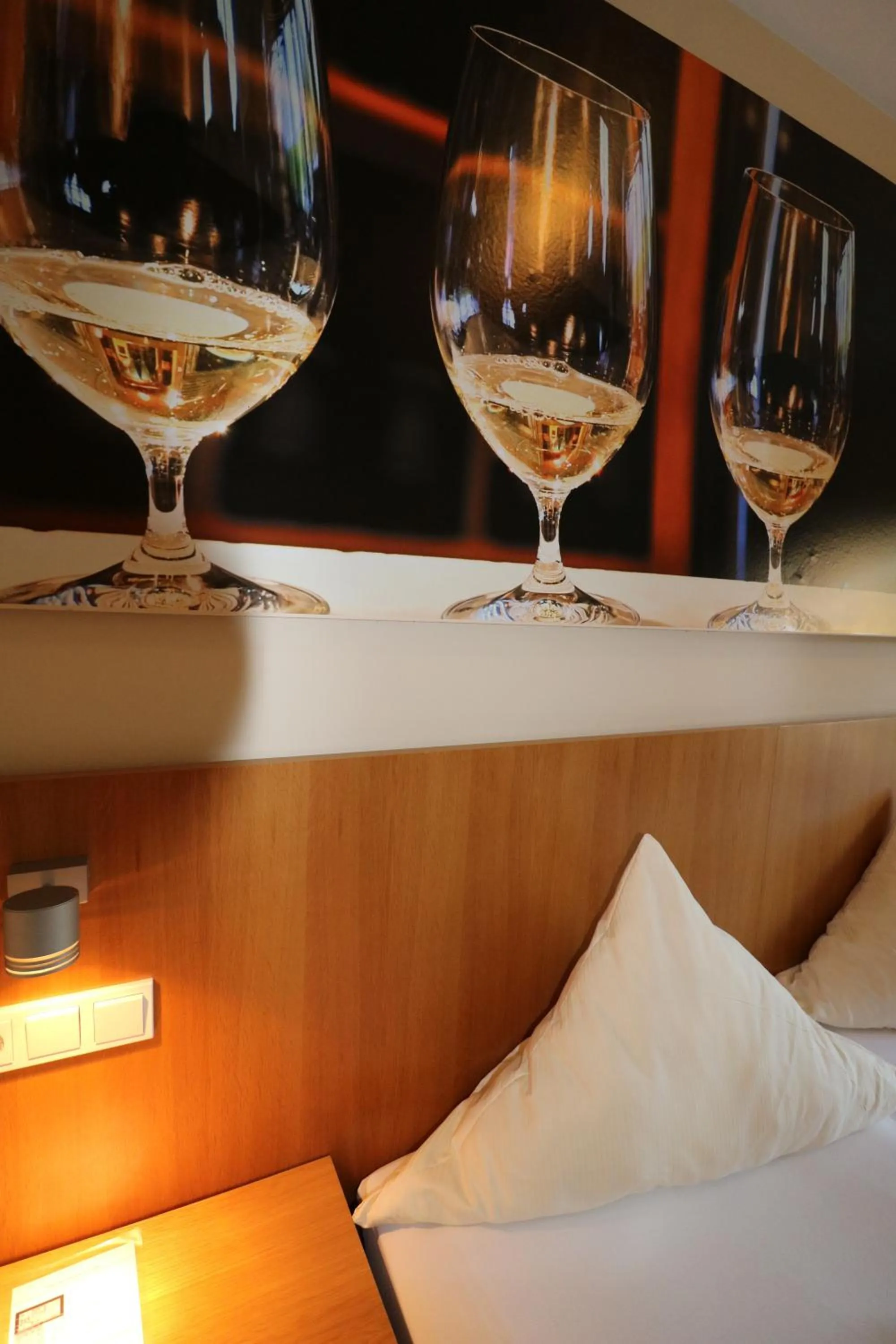 Decorative detail, Bed in Christiana's Wein & Art Hotel