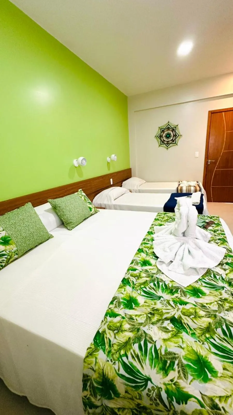 Bed in Pousada Cantinho da Praia