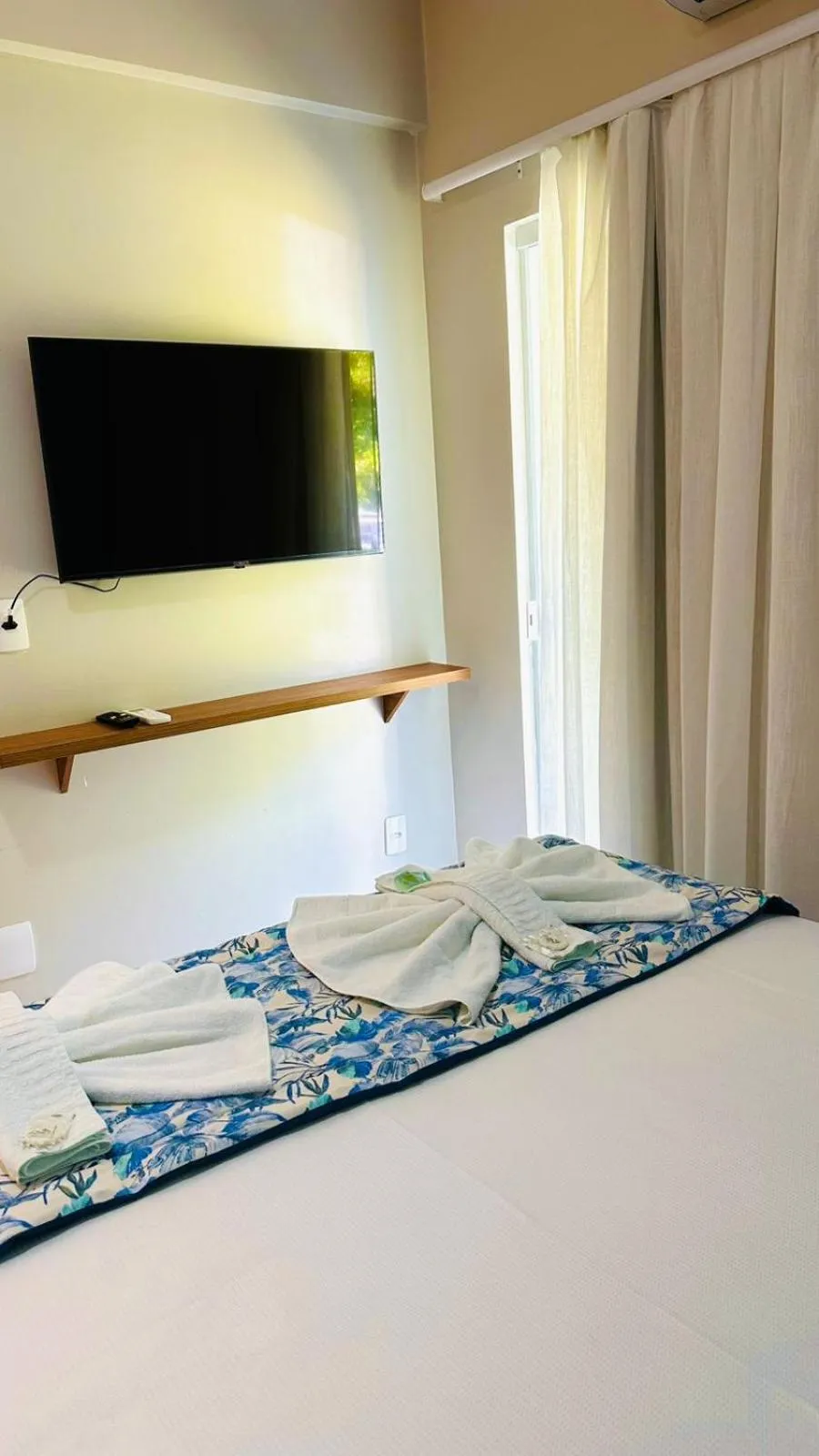 Bed in Pousada Cantinho da Praia