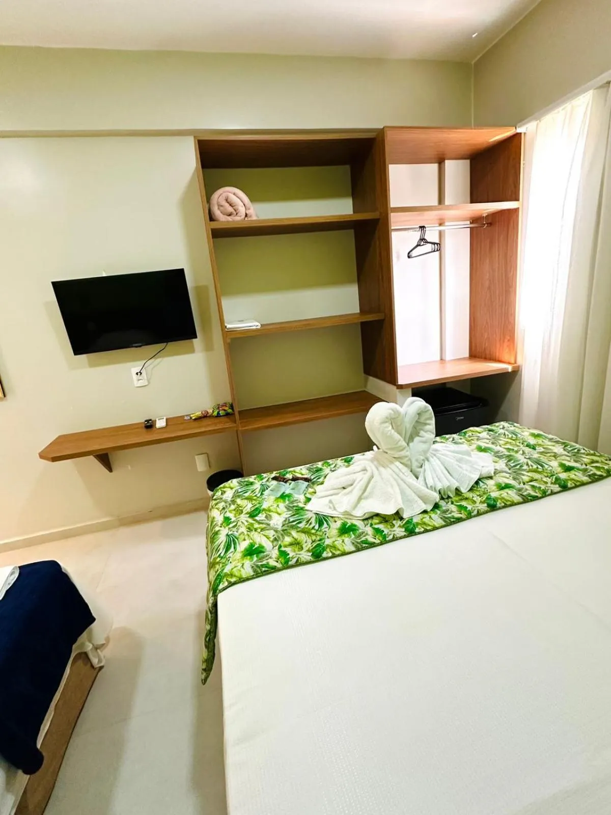 Bed in Pousada Cantinho da Praia