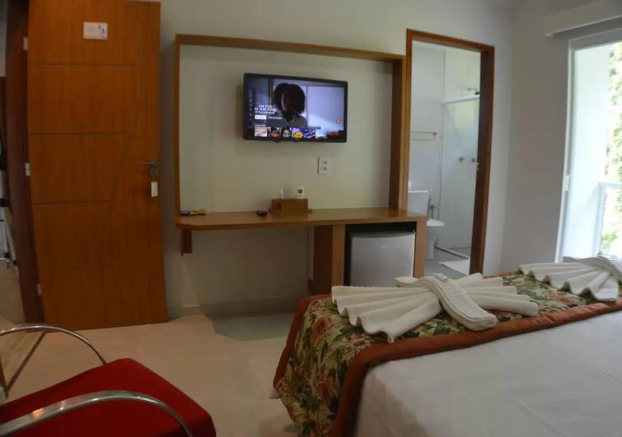Photo of the whole room, Bed in Pousada Cantinho da Praia