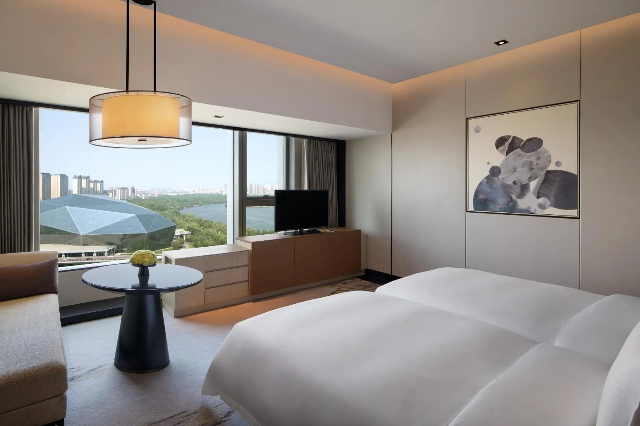 Bed in New World Shenyang Hotel