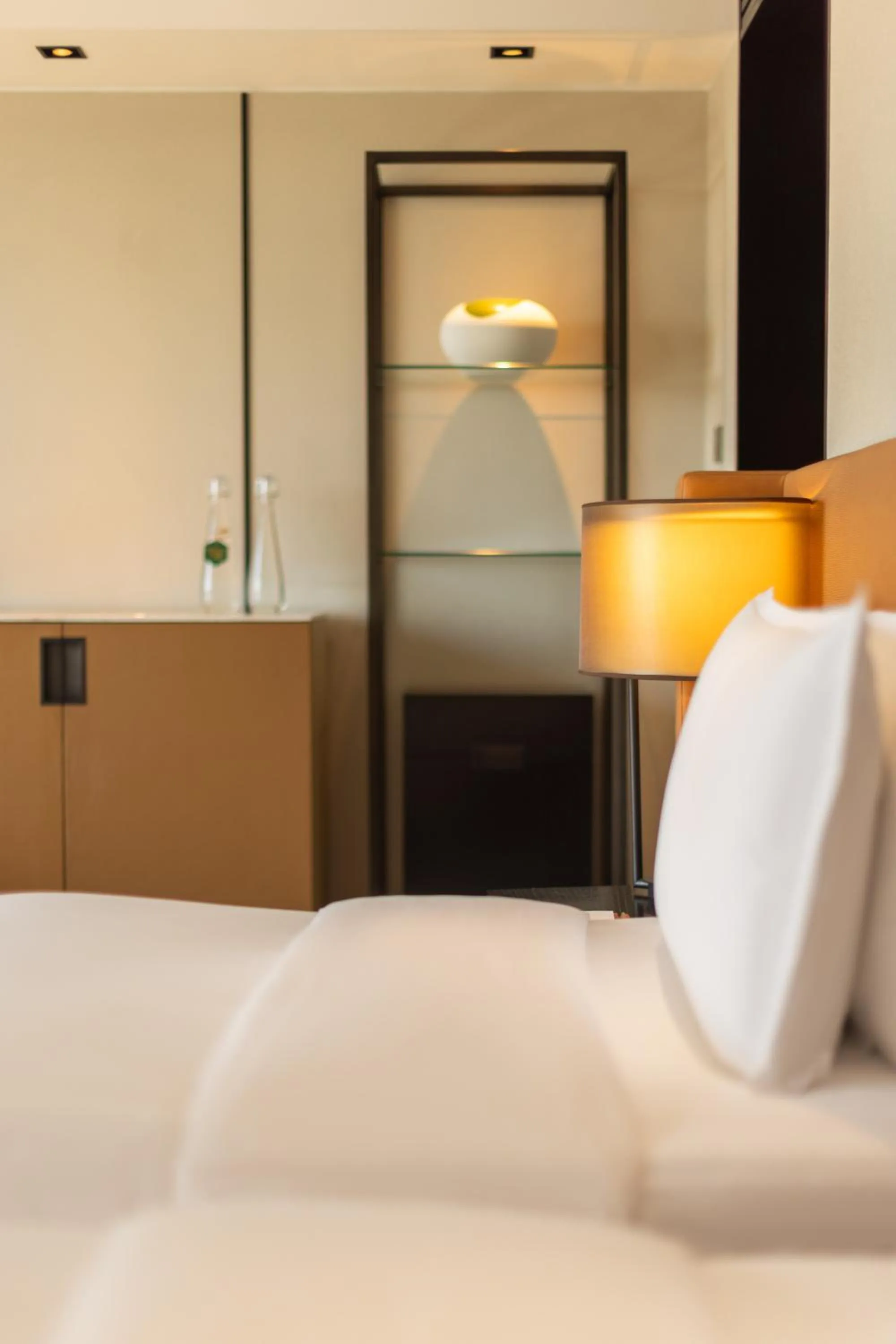 Bed in New World Shenyang Hotel