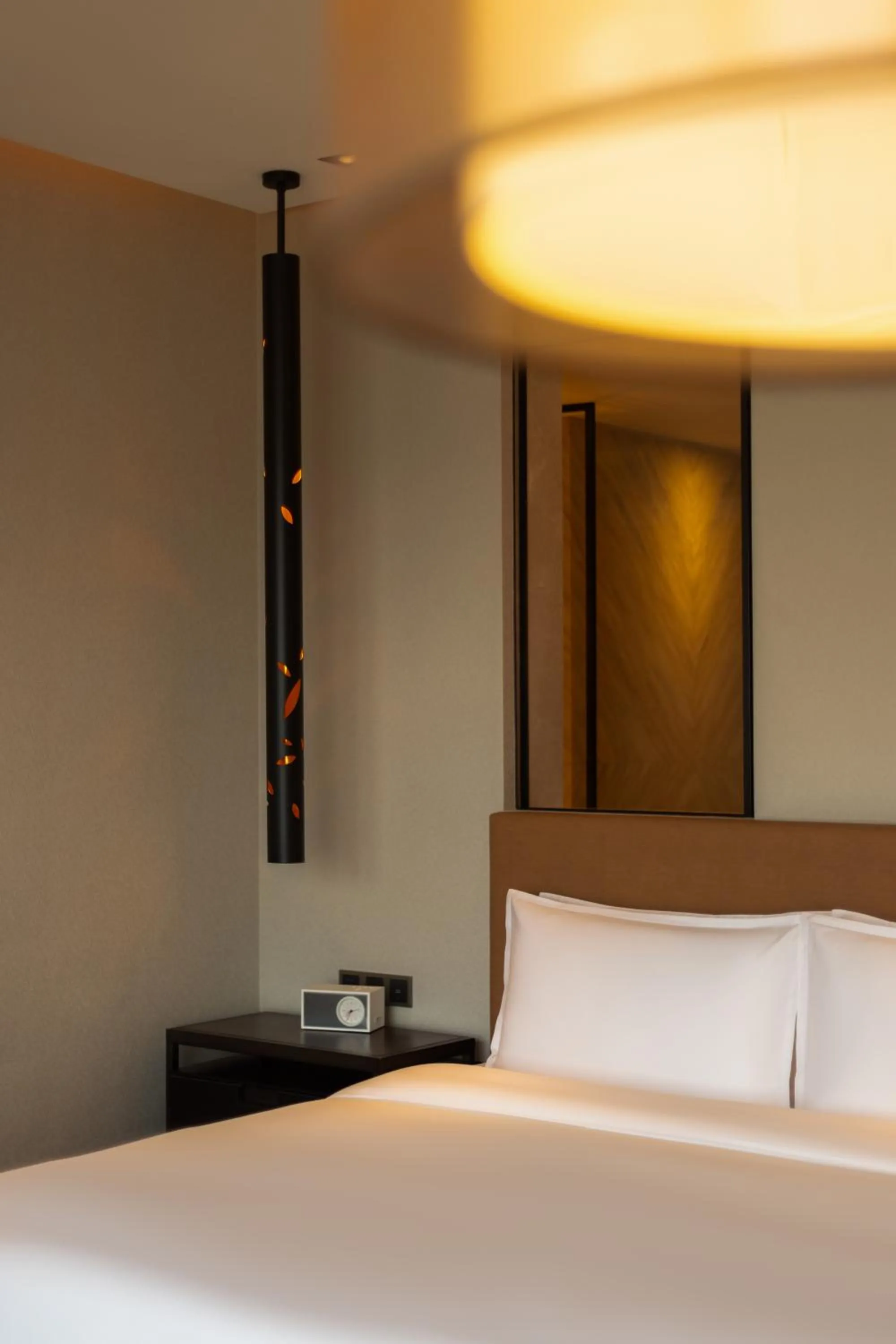 Bed in New World Shenyang Hotel