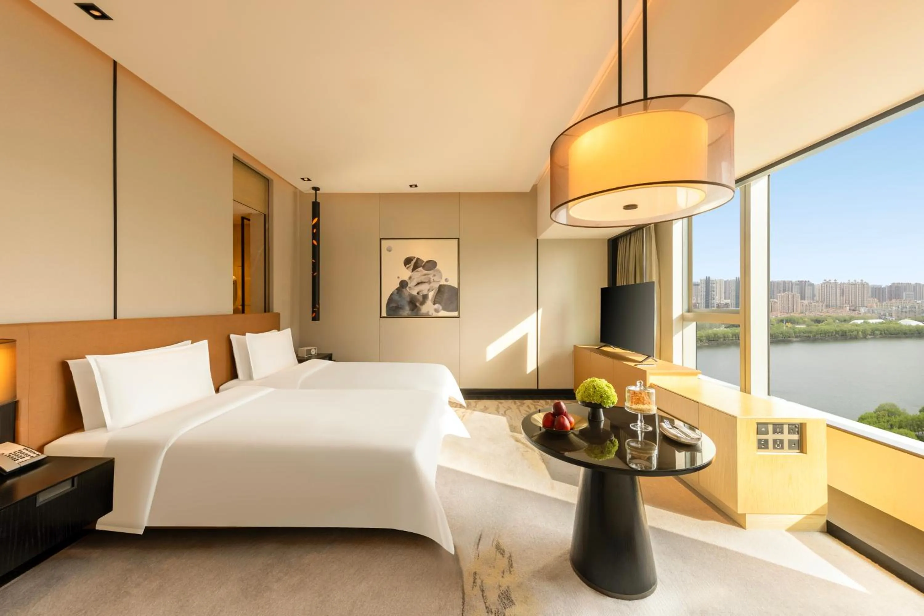 Bed in New World Shenyang Hotel