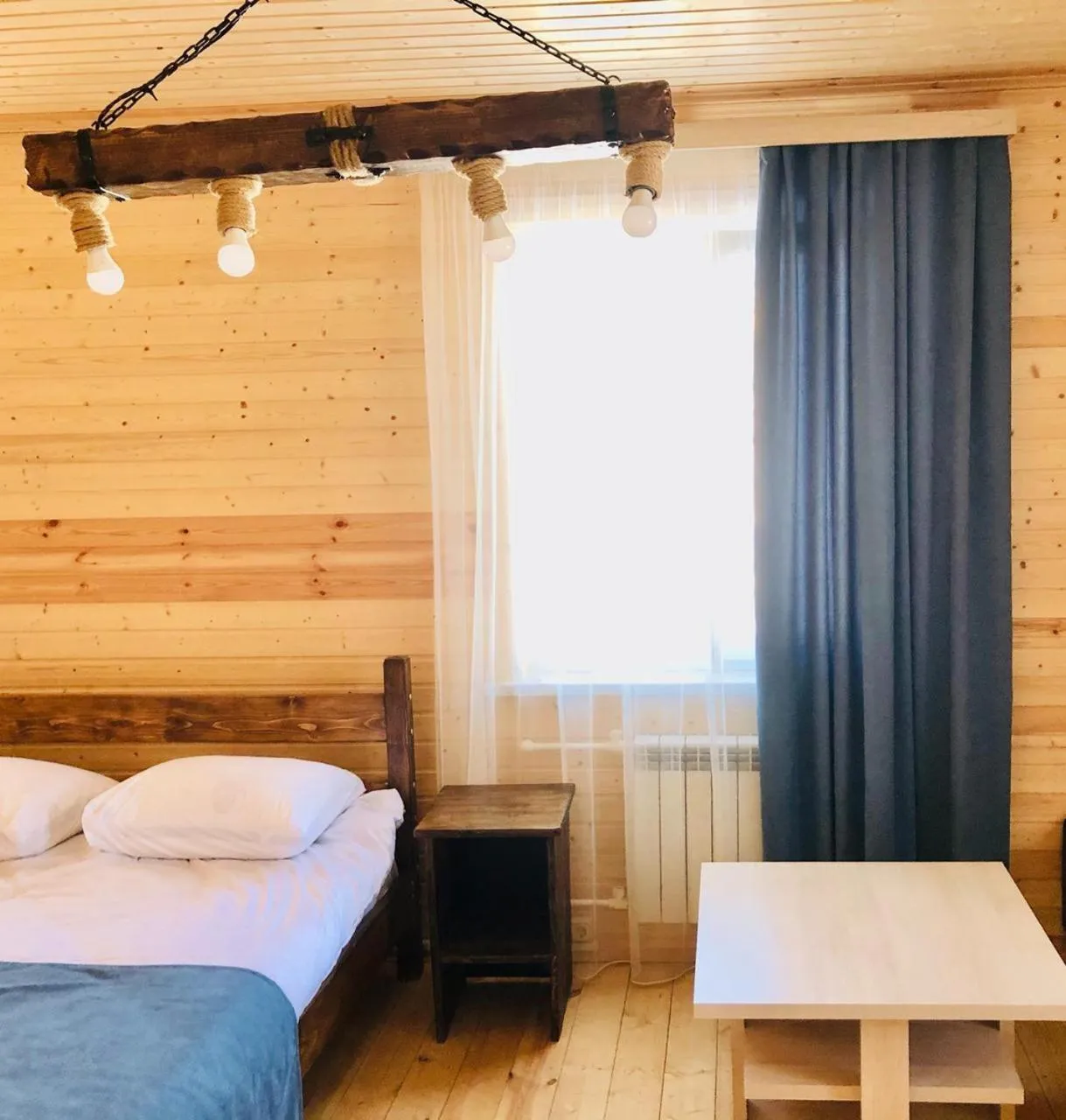 Bed in COTTAGE CHALET and TOURS