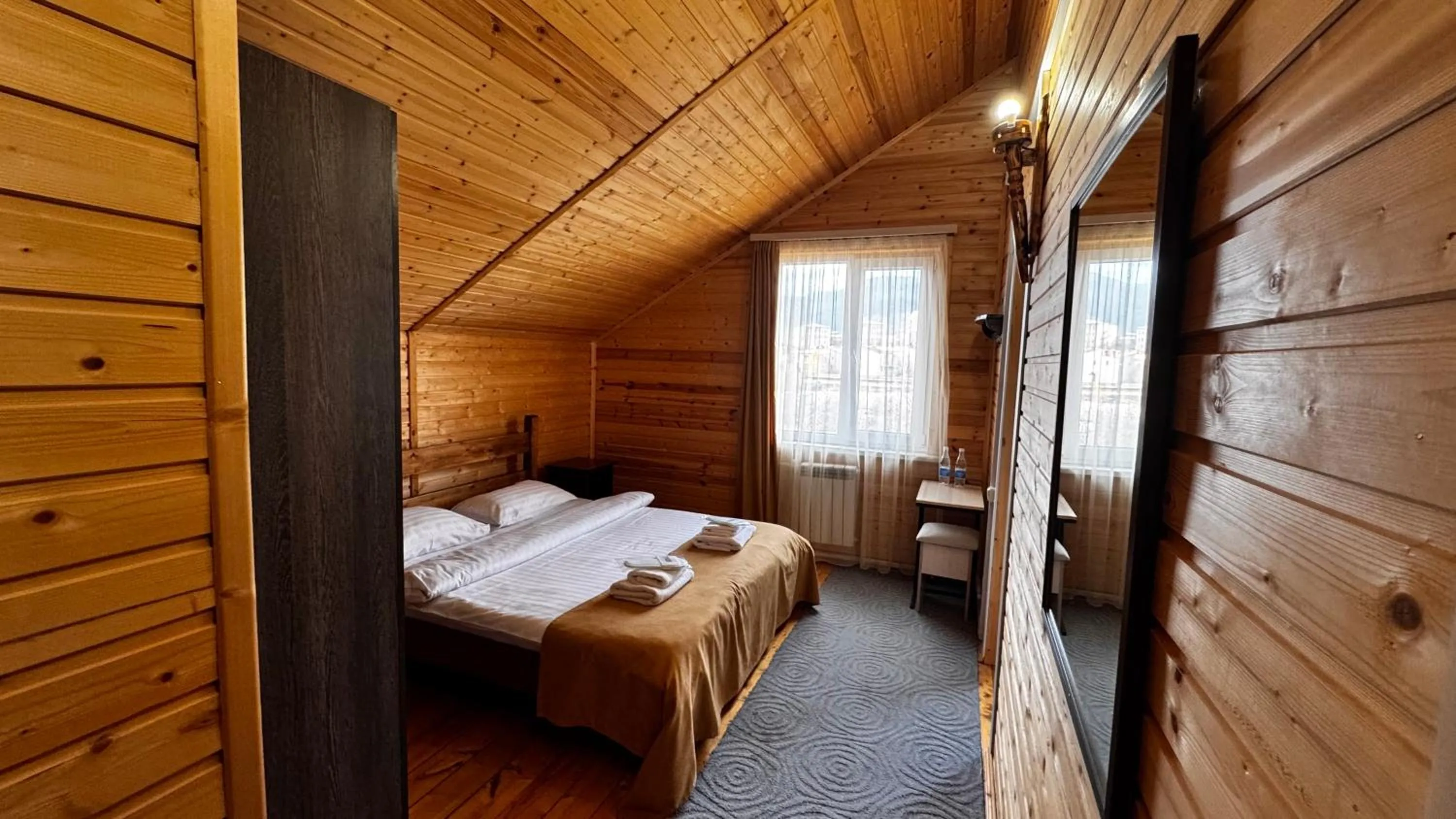 Bed in COTTAGE CHALET and TOURS