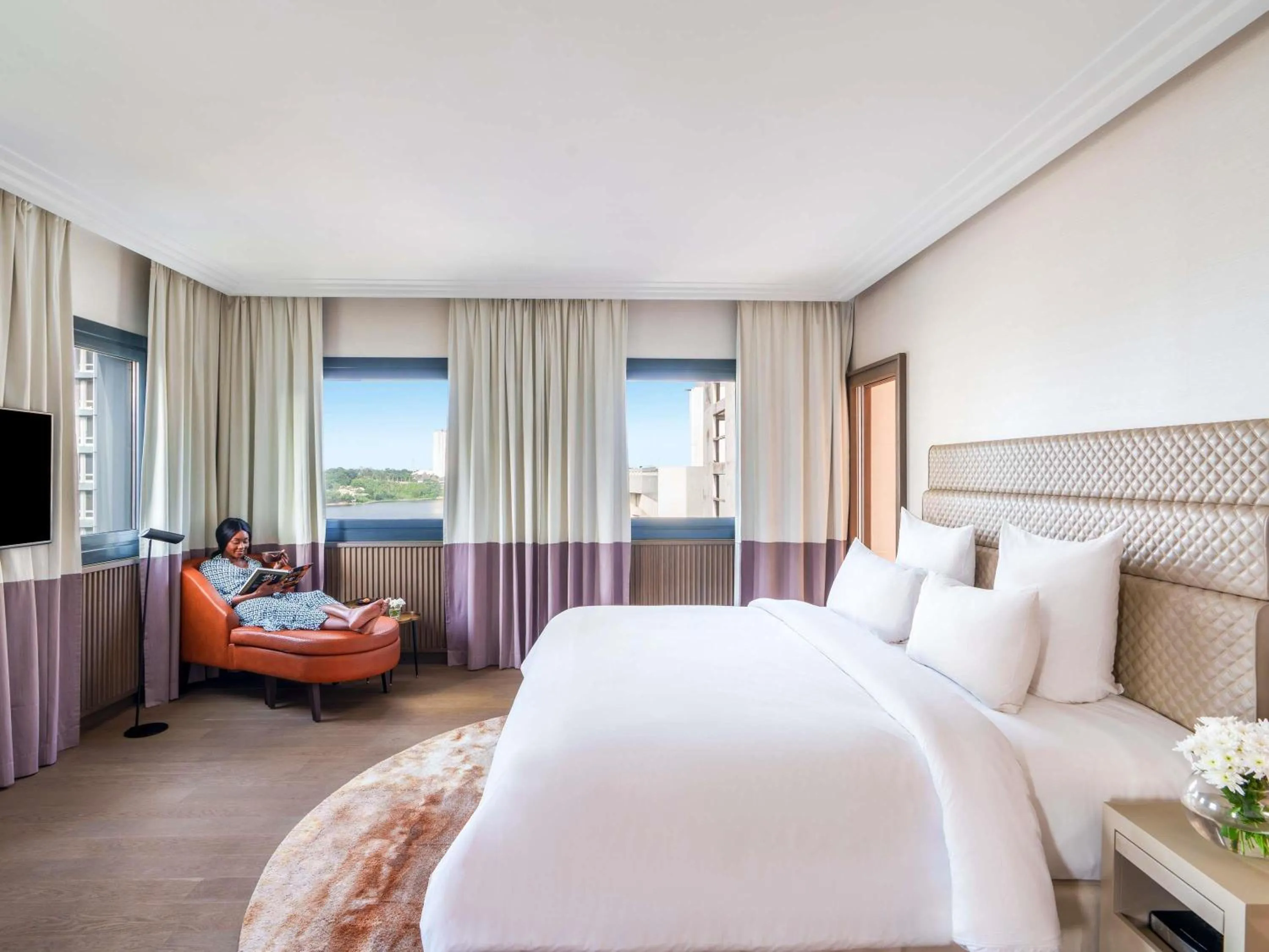 Photo of the whole room, Bed in Movenpick Hotel Abidjan-Accor Group