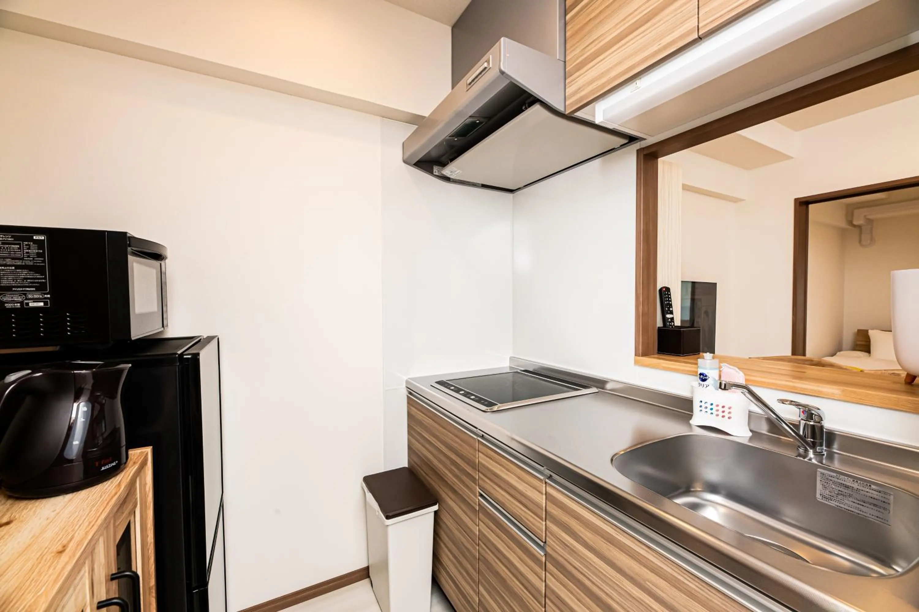 Kitchen or kitchenette in Tomariehotel & condominium
