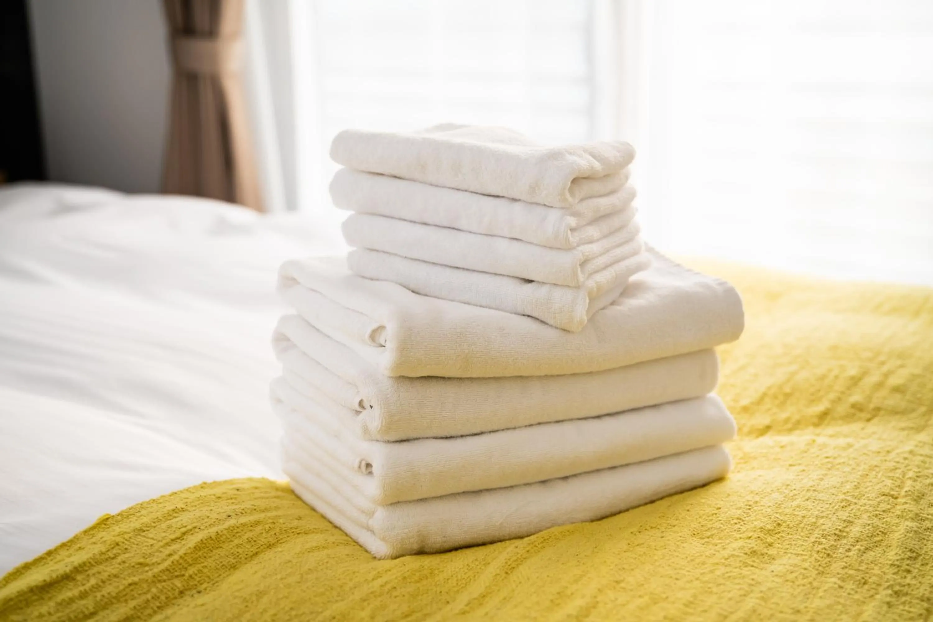 Photo of the whole room, Bed in Tomariehotel & condominium