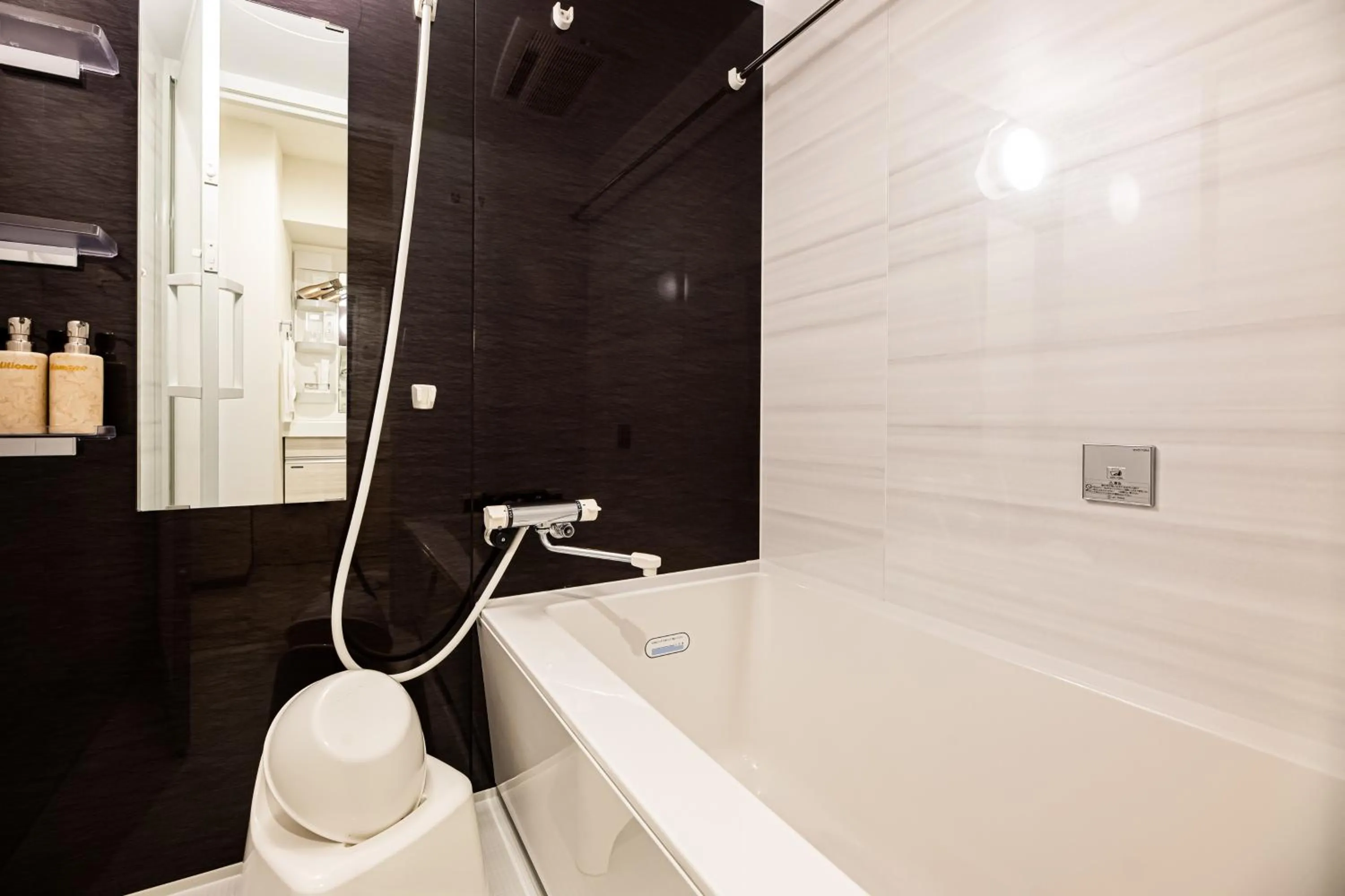Bathroom in Tomariehotel & condominium