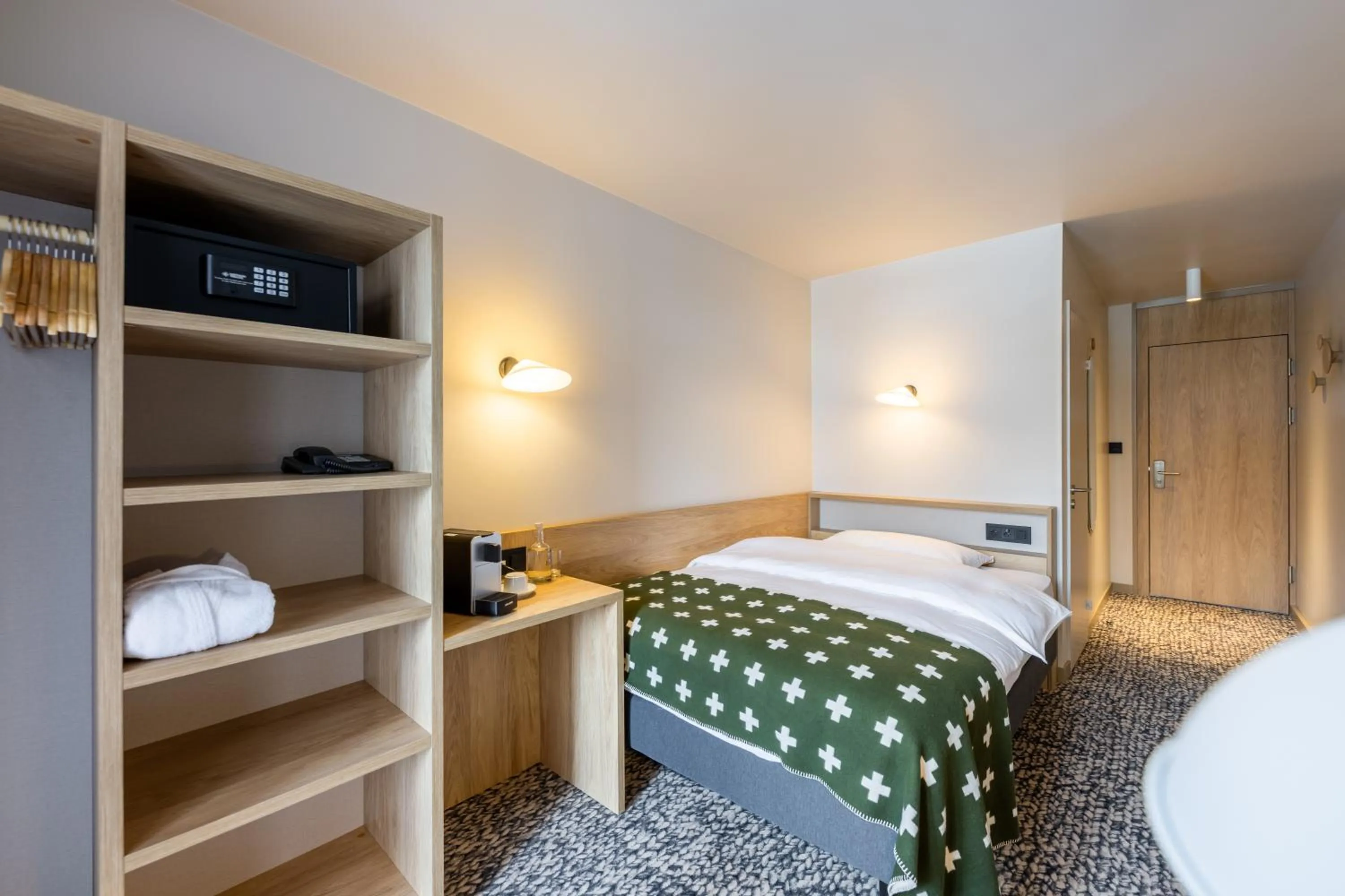 Bedroom, Bed in Hotel Schweizerhof Sils Maria, a Faern Collection Hotel