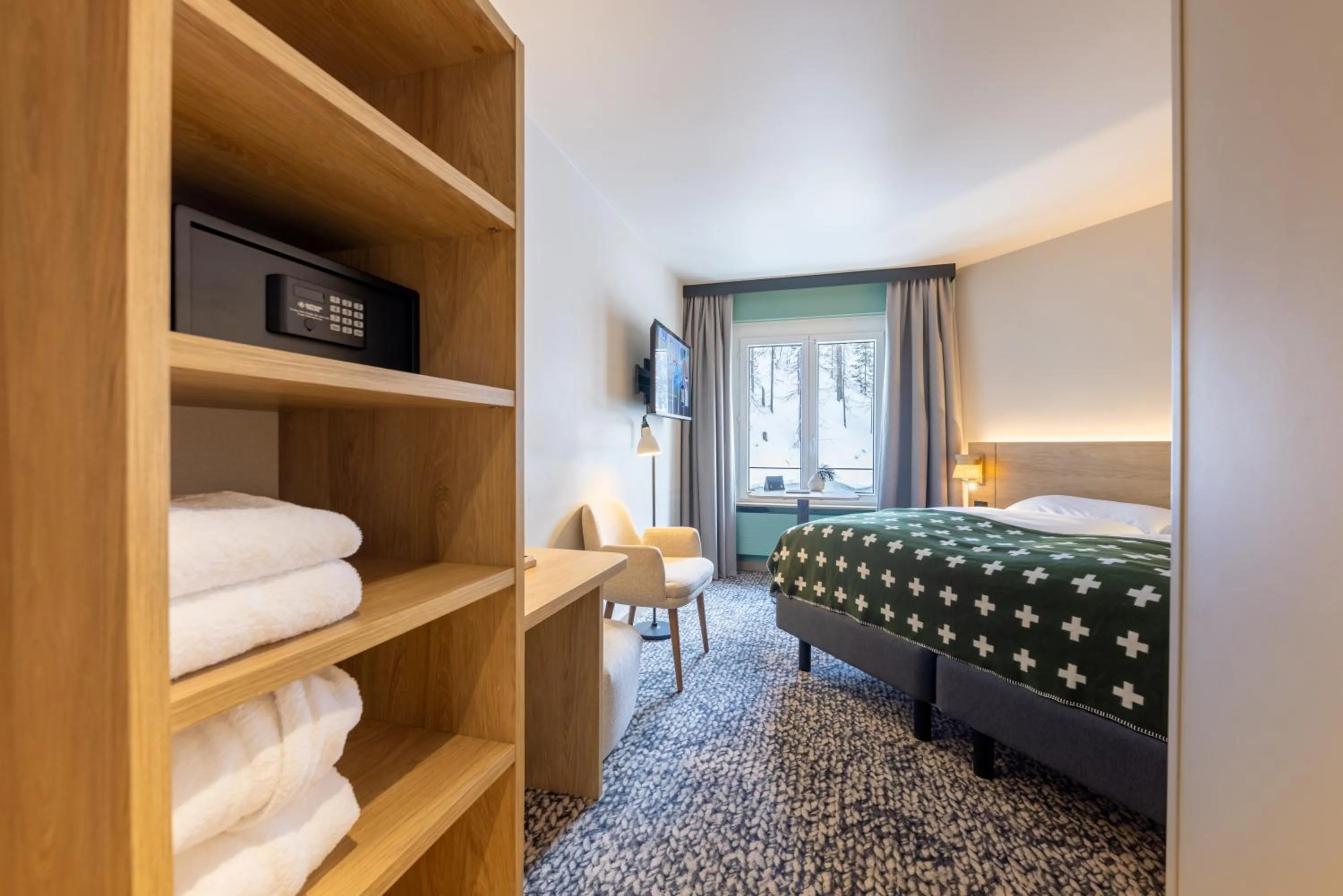 Bedroom, Bed in Hotel Schweizerhof Sils Maria, a Faern Collection Hotel