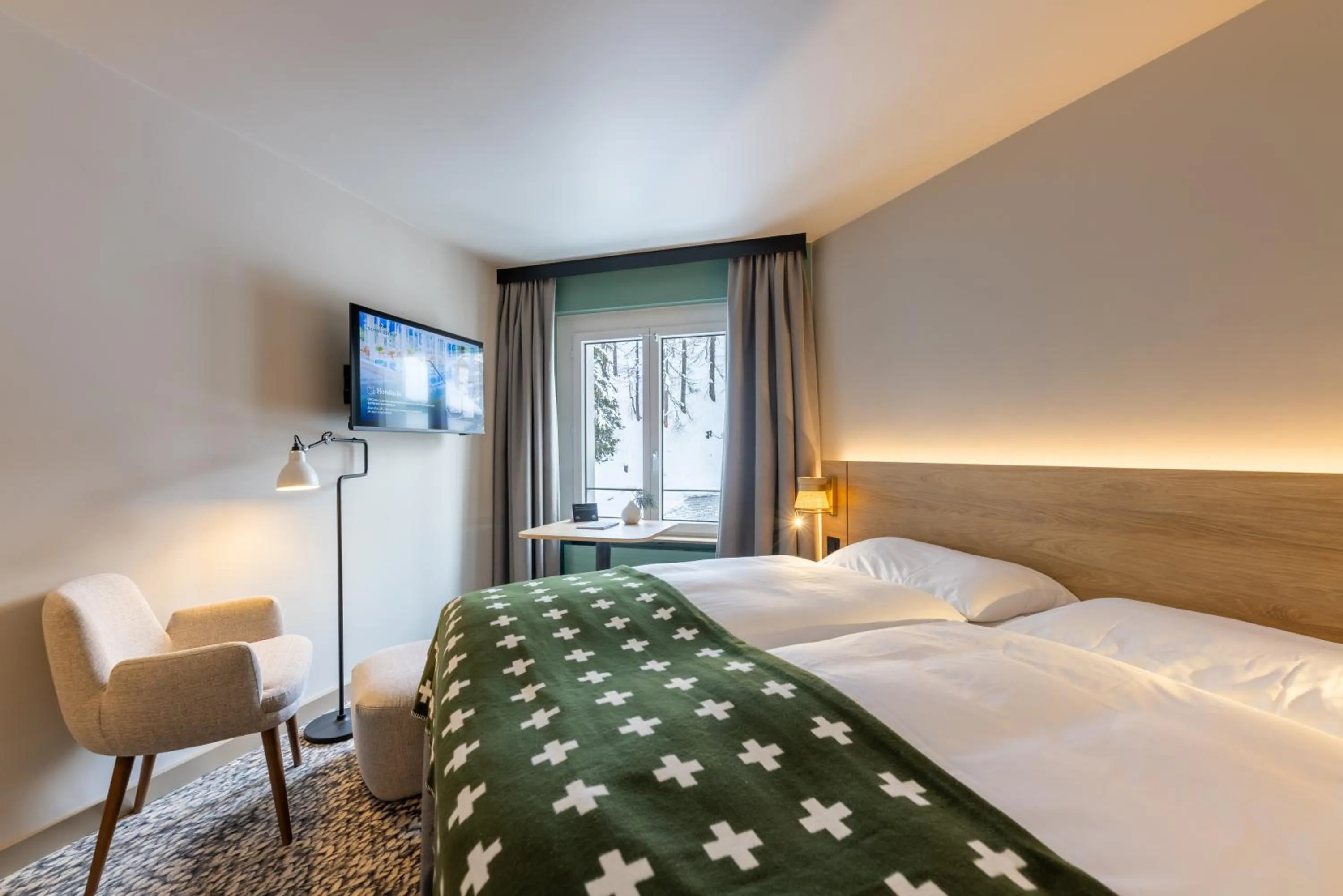 Bedroom, Bed in Hotel Schweizerhof Sils Maria, a Faern Collection Hotel