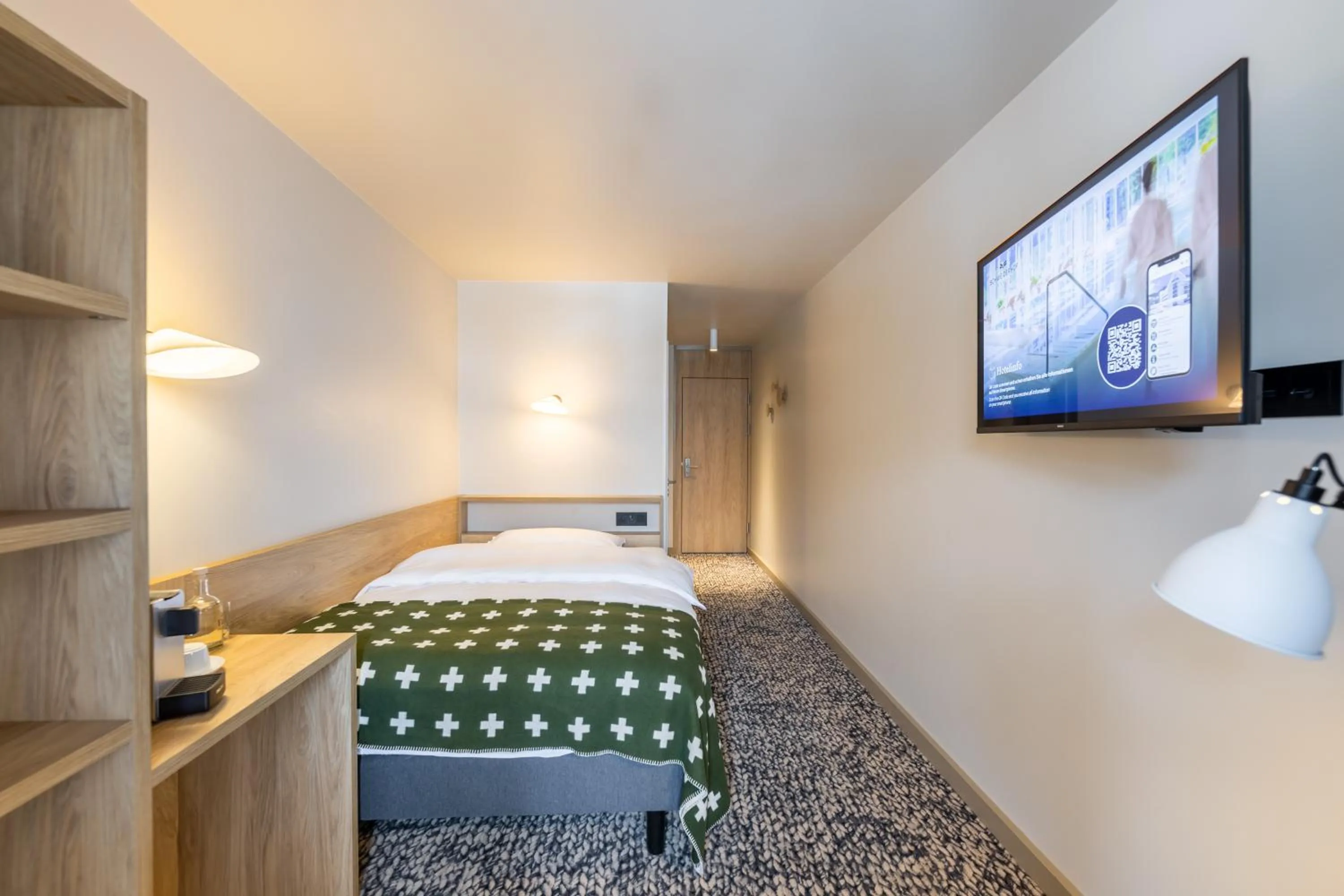 Bedroom, Bed in Hotel Schweizerhof Sils Maria, a Faern Collection Hotel