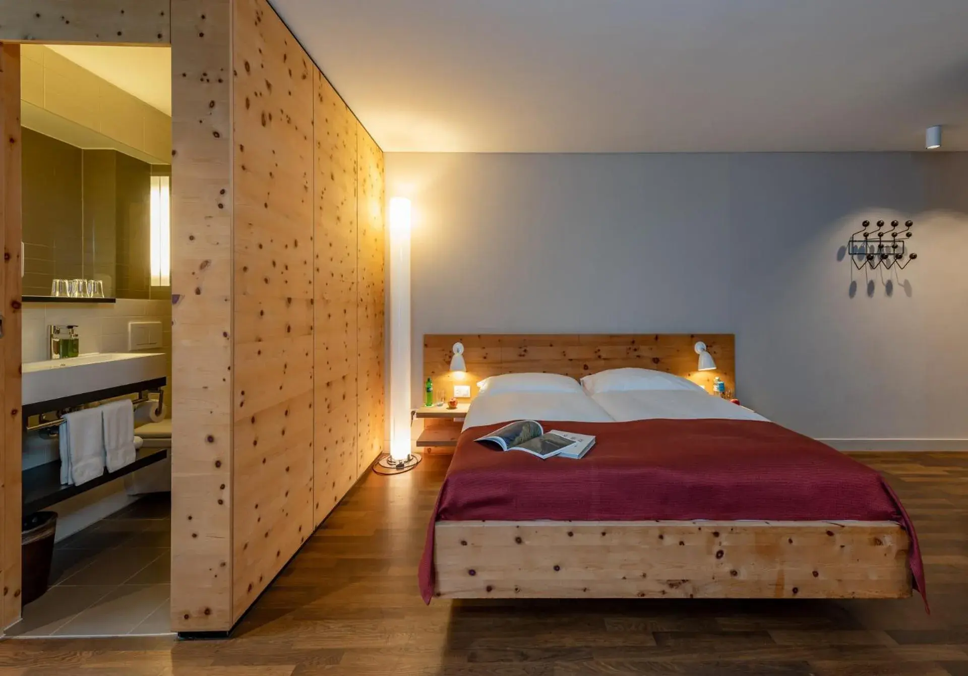 Bathroom, Bed in Hotel Schweizerhof Sils Maria, a Faern Collection Hotel Bathroom, Bed in Hotel Schweizerhof Sils Maria, a Faern Collection Hotel