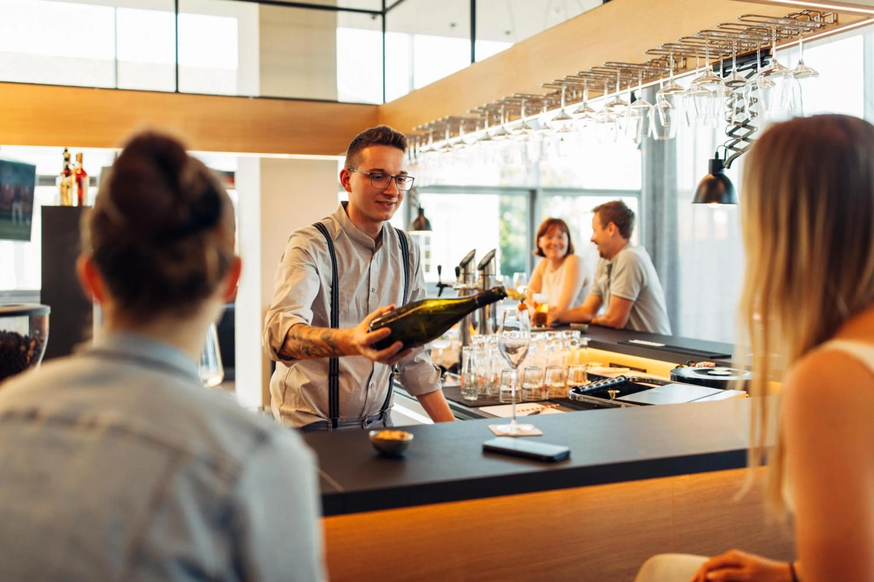 Lounge or bar in harry's home Steyr hotel & apartments