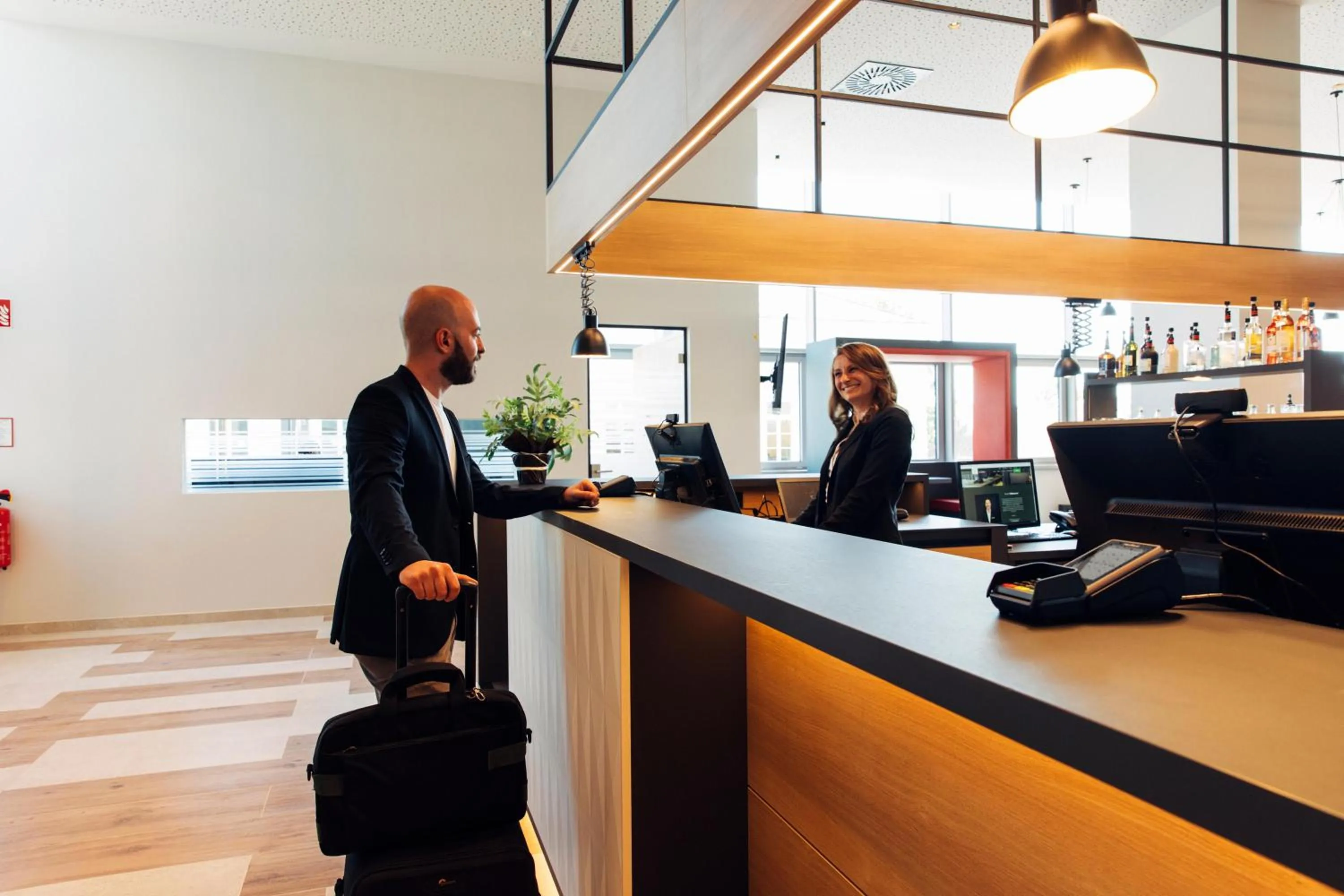 Lobby or reception in harry's home Steyr hotel & apartments