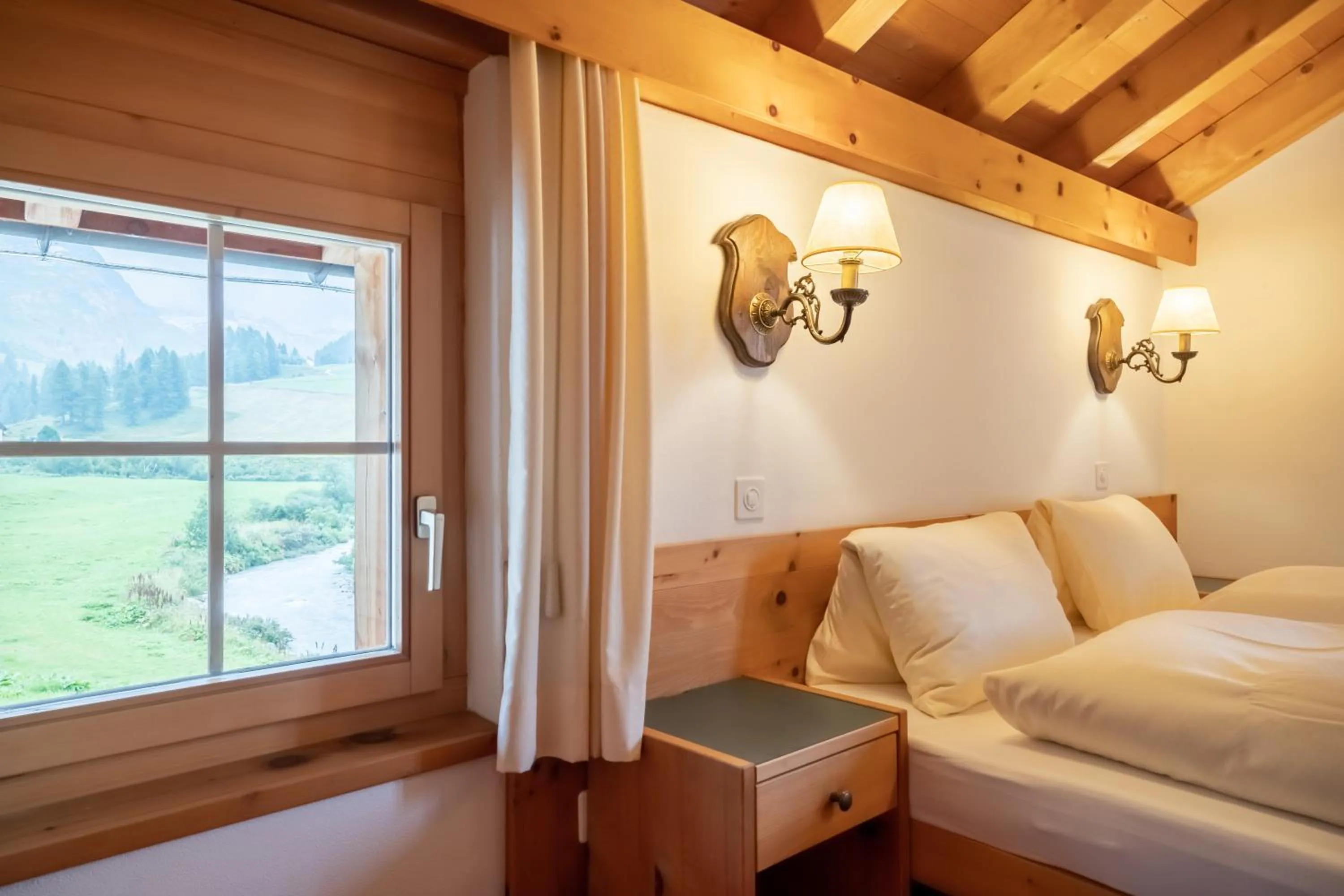 View (from property/room), Bed in Hotel Chesa Pool