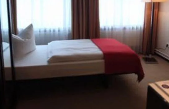 Photo of the whole room, Bed in DämeritzSeehotel