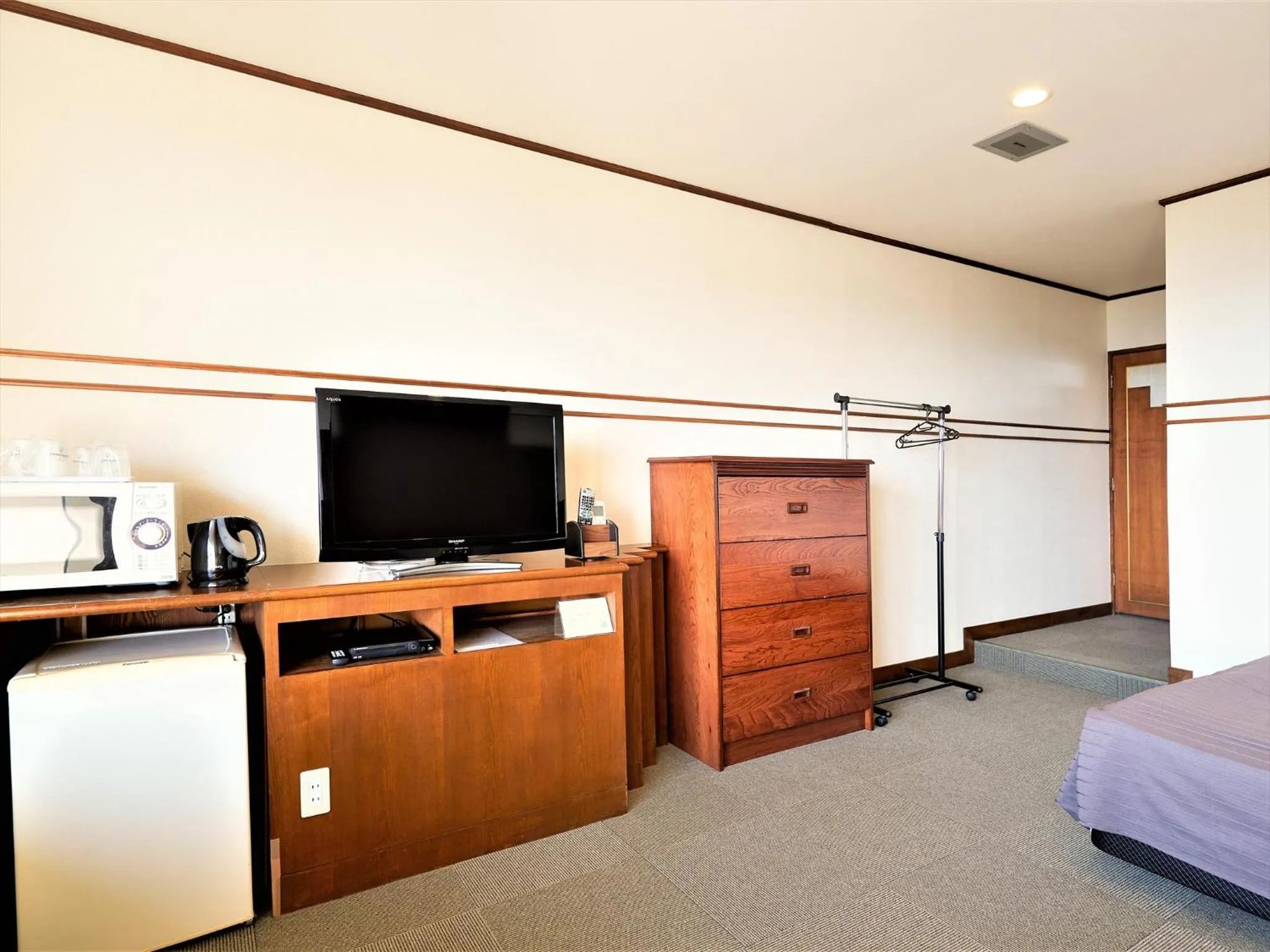 Photo of the whole room, Bed in Purari OKINAWA