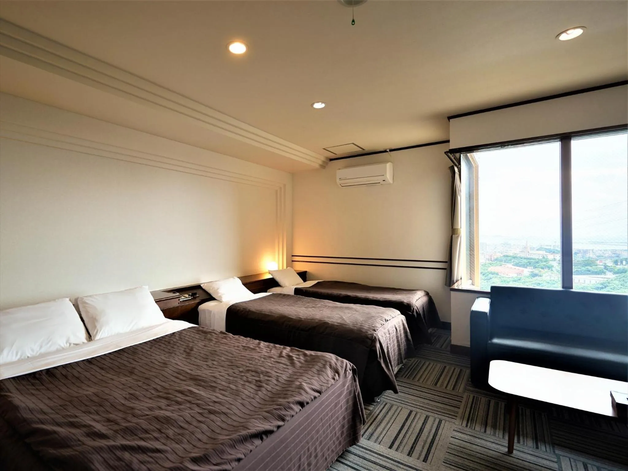 Photo of the whole room, Bed in Purari OKINAWA