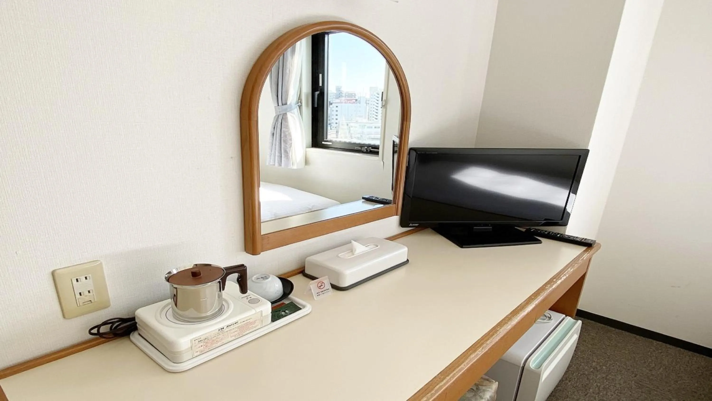 Bed in Smile Hotel Kitaasaka