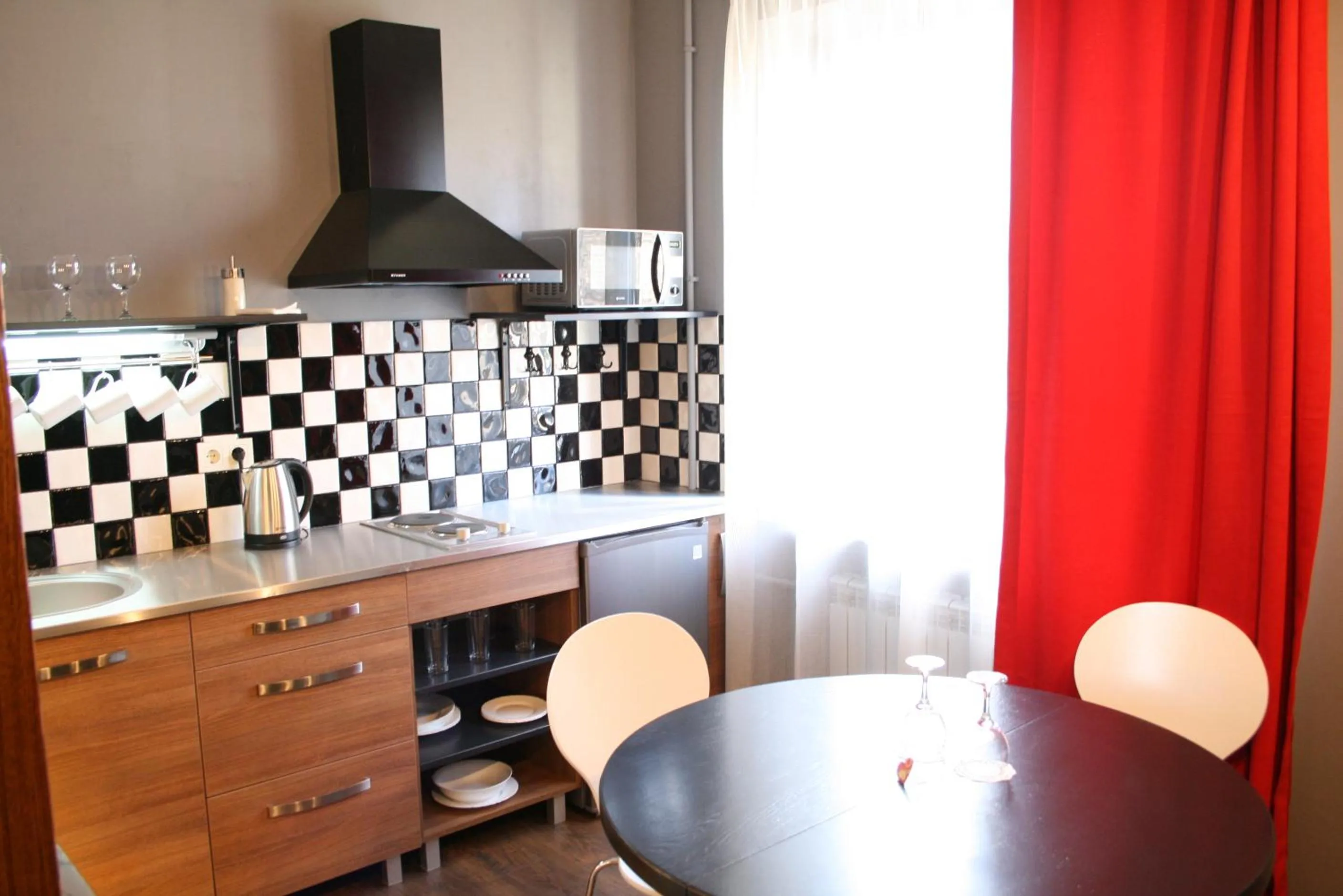 Kitchen or kitchenette in Aparthotel