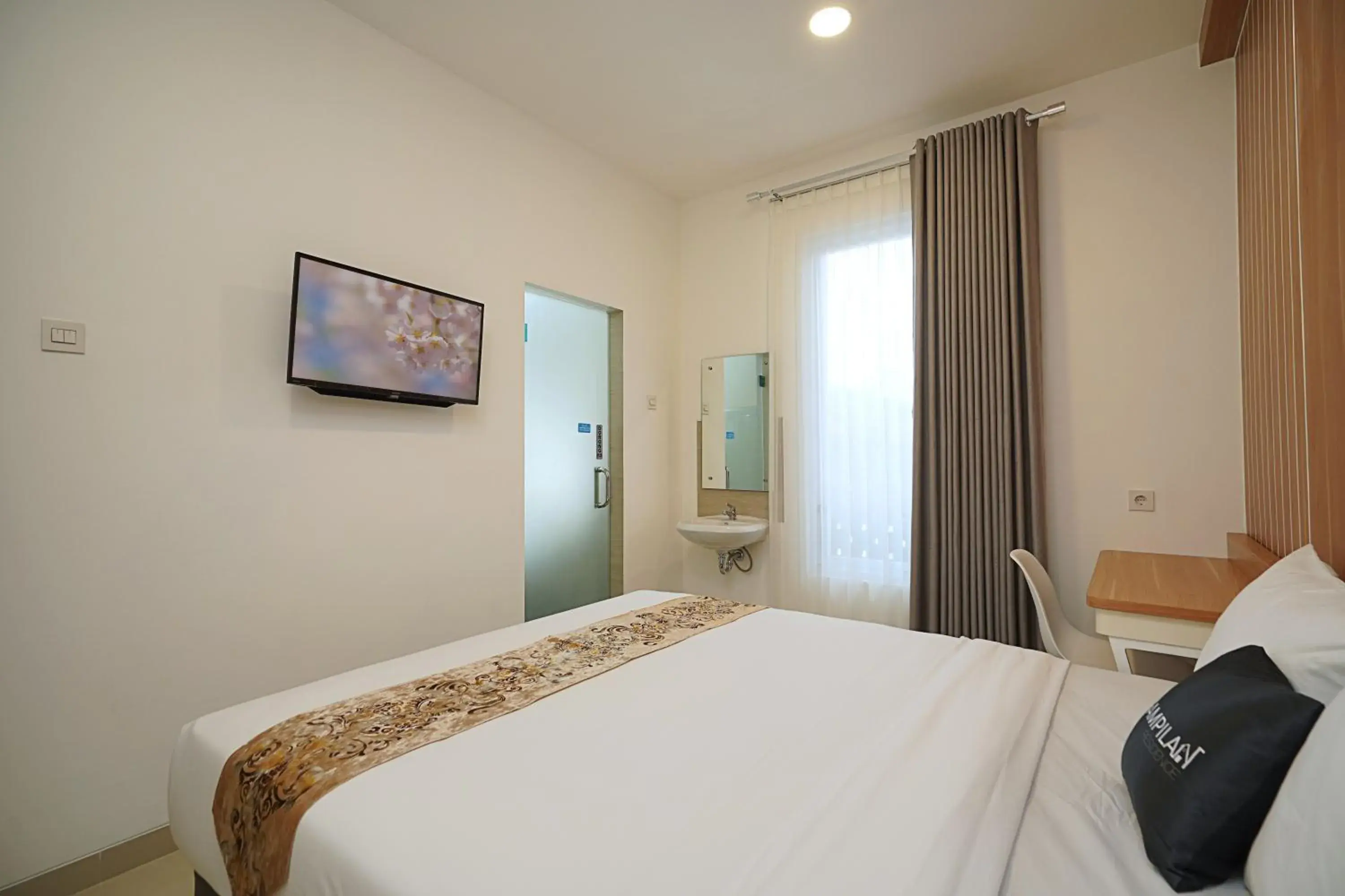 Bed in Ngampilan Residence Yogyakarta Mitra RedDoorz Bed in Ngampilan Residence Yogyakarta Mitra RedDoorz