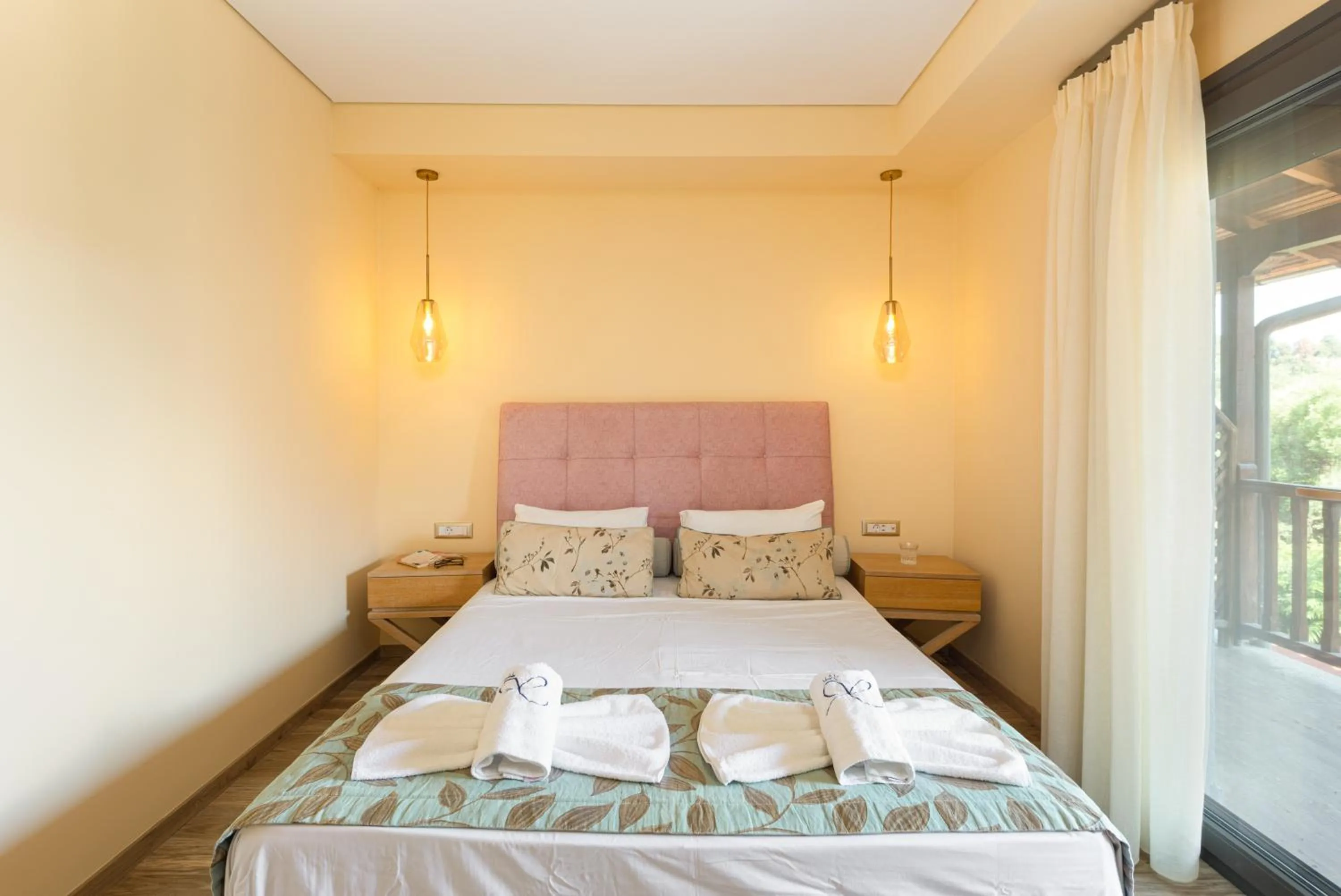 Bed in Regos Resort Hotel