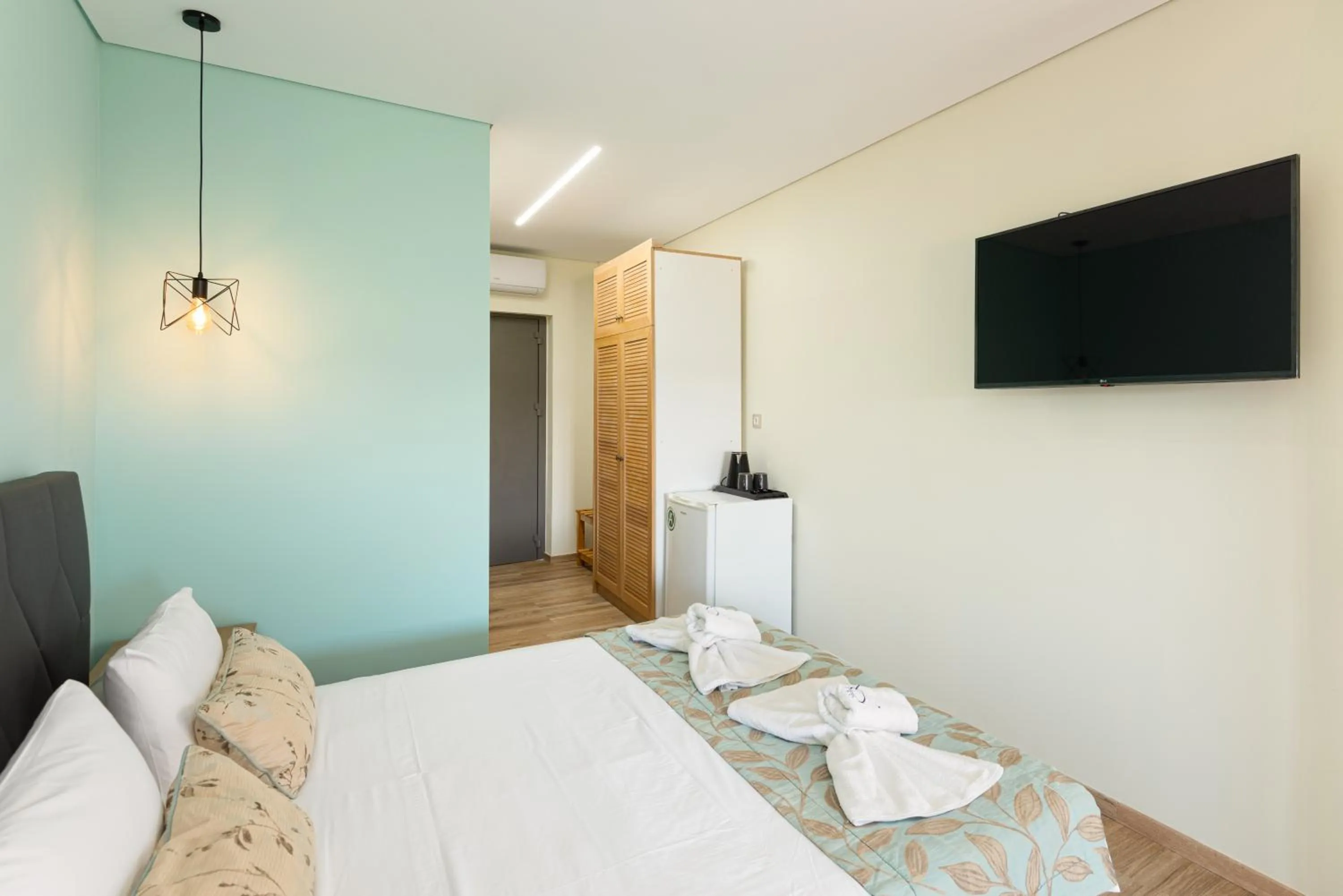 Bed in Regos Resort Hotel