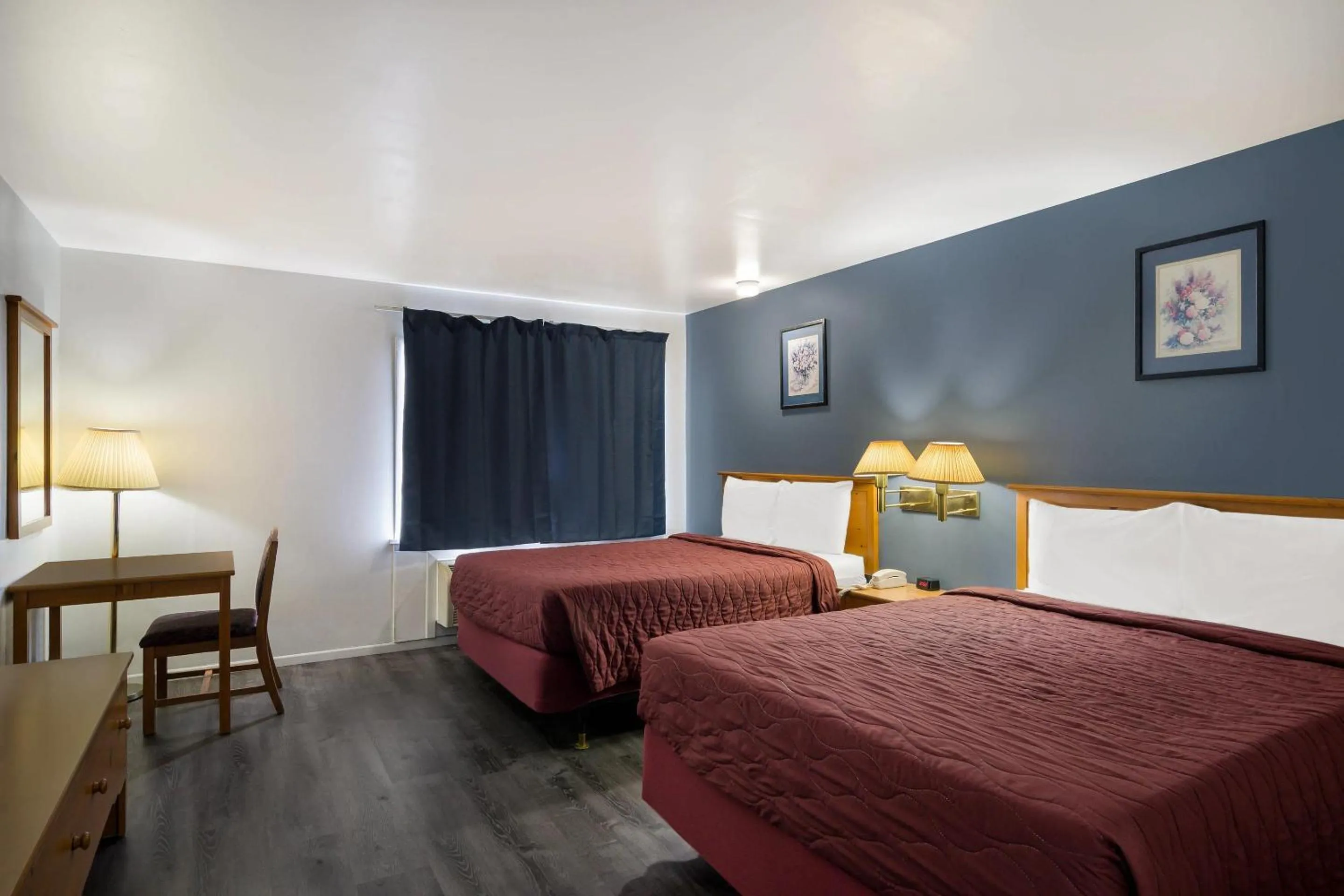 Bedroom, Bed in Rodeway Inn & Suites Sidney Historic Downtown I-80