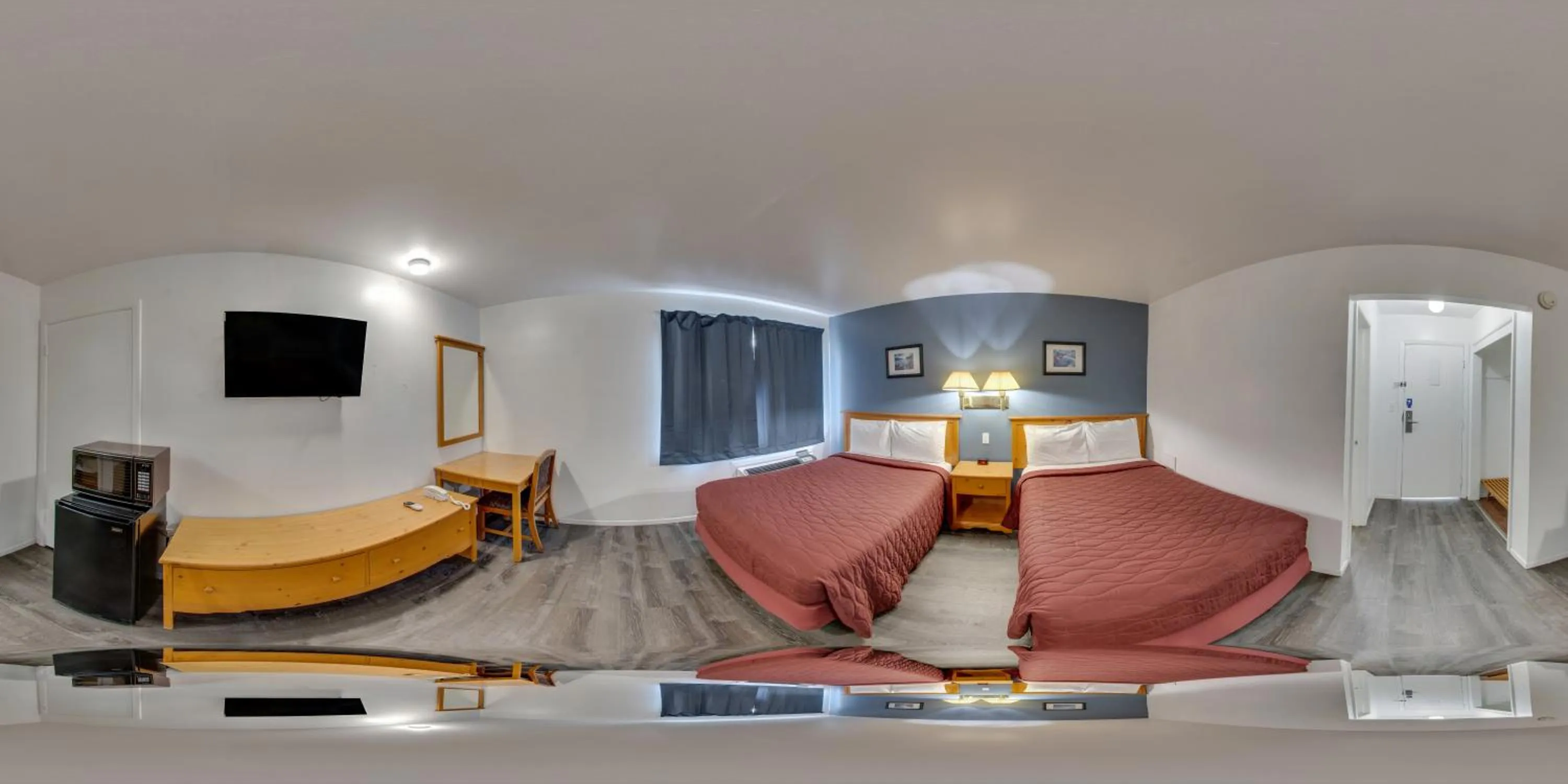 Photo of the whole room, Bed in Rodeway Inn & Suites Sidney Historic Downtown I-80