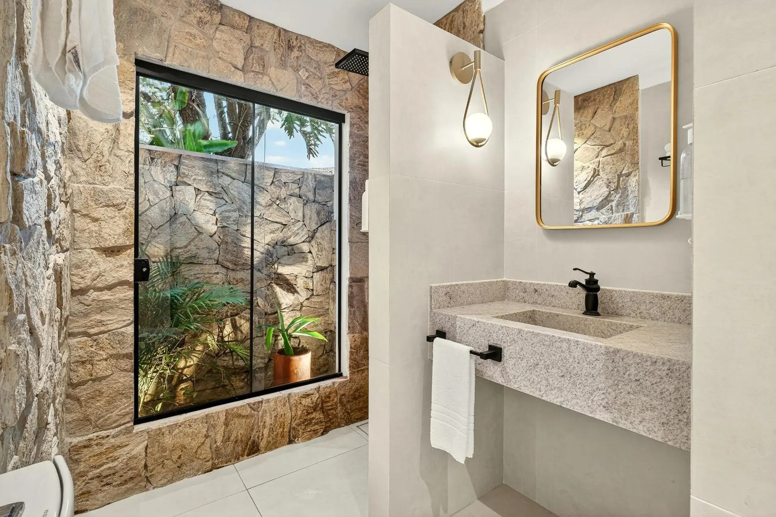 Bathroom in Grinbergs Village Hotel Bathroom in Grinbergs Village Hotel