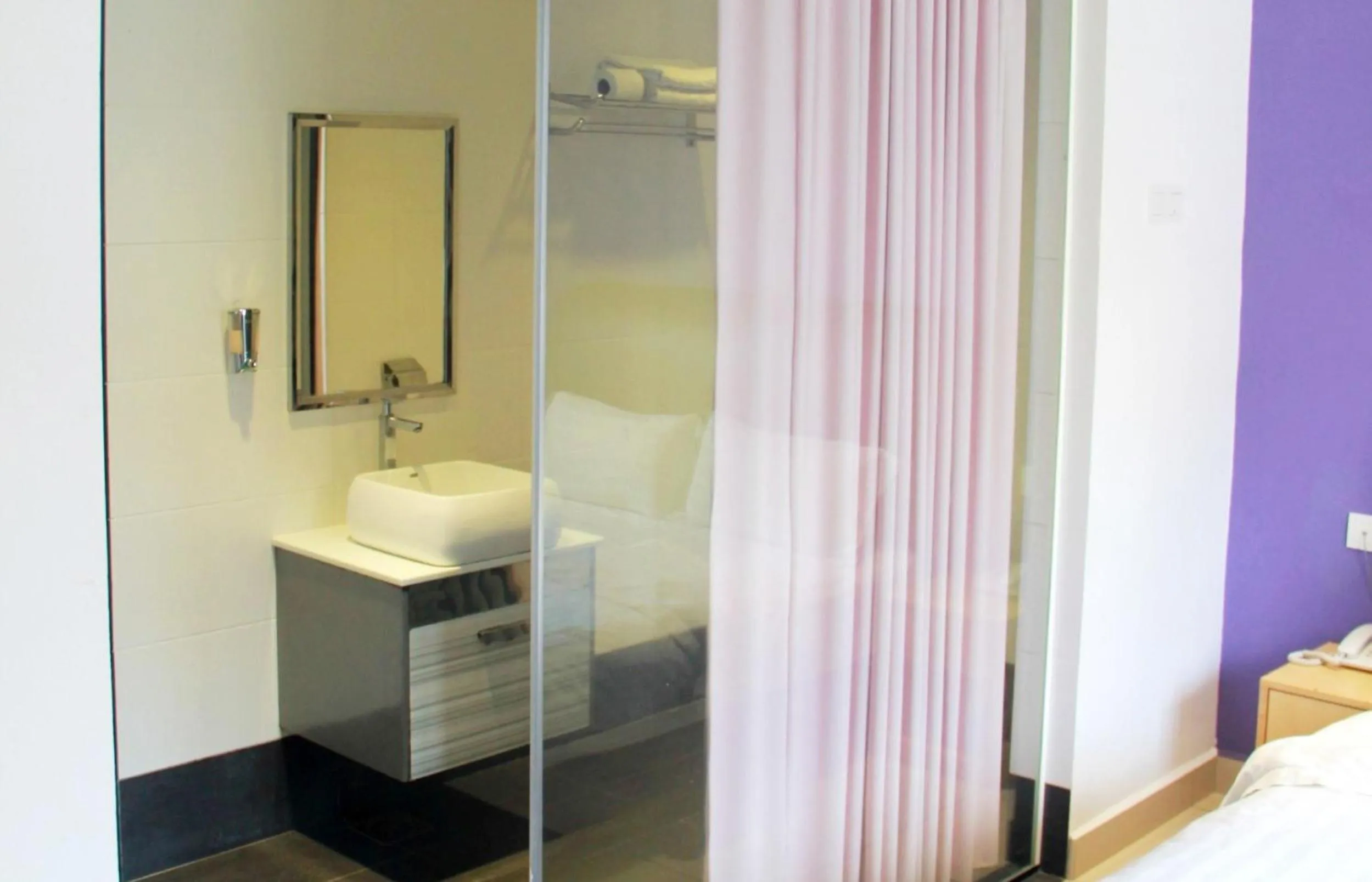 Bathroom, Bed in East Sun Hotel Sekinchan Self Check In