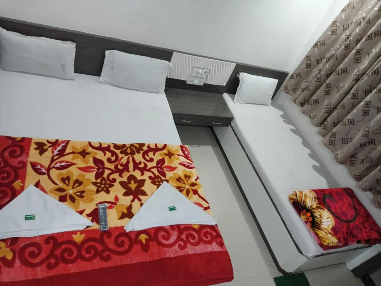 Bed in Hotel Shri Sai Darshan