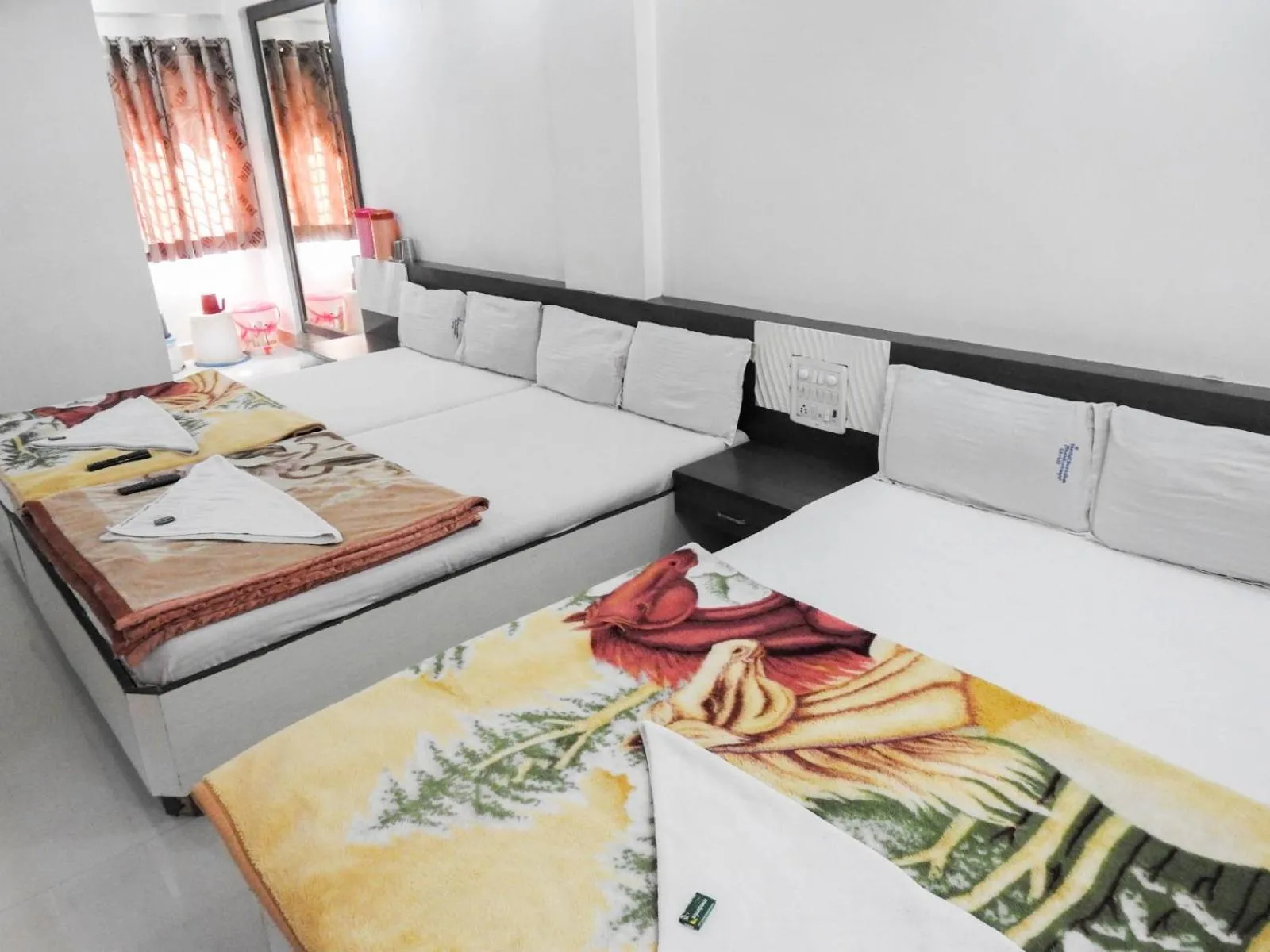 Bed in Hotel Shri Sai Darshan