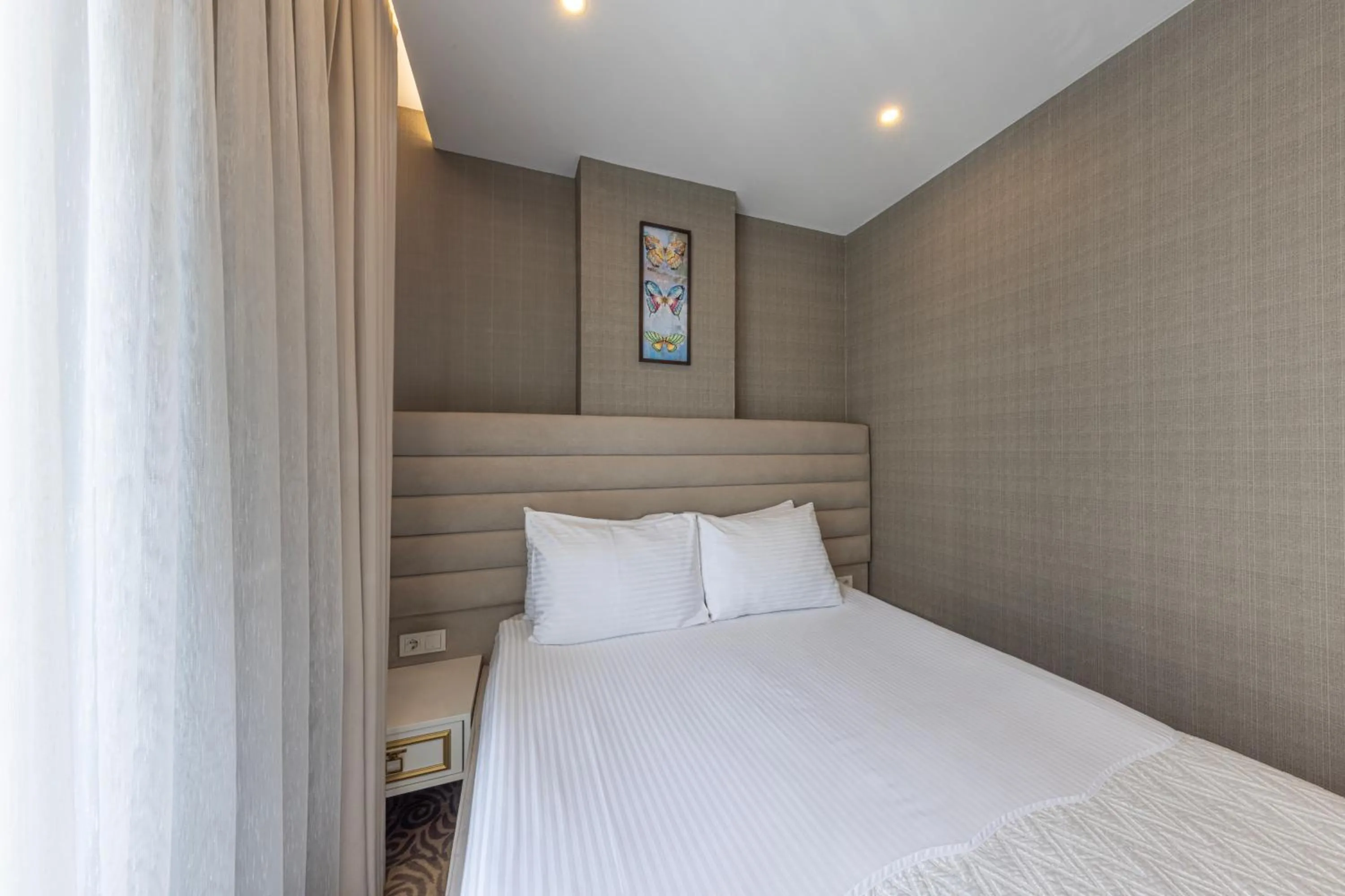 Bed in Mr BEYAZ HOTEL