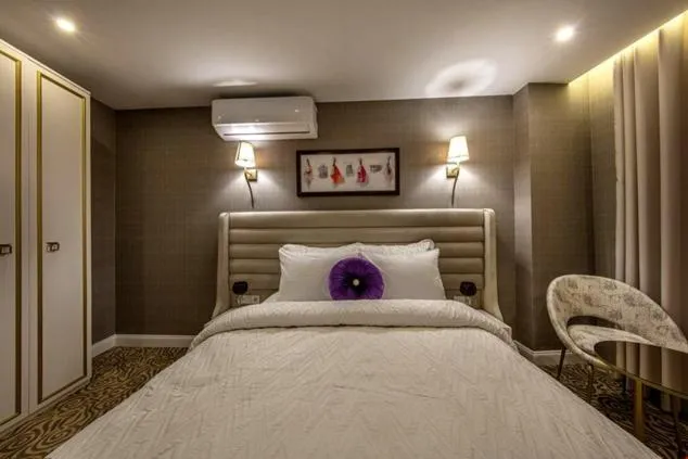 Bed in Mr BEYAZ HOTEL