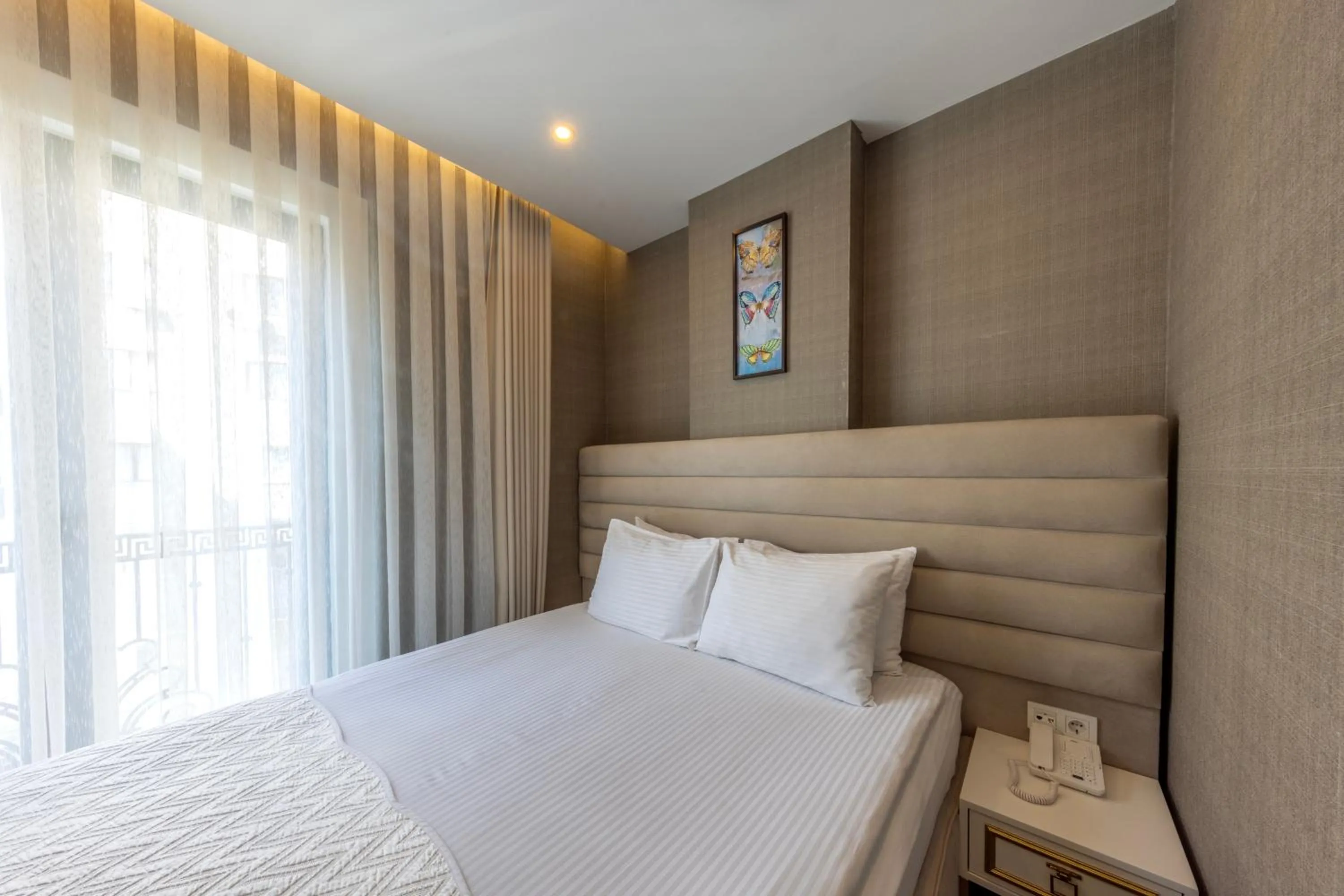 Bed in Mr BEYAZ HOTEL