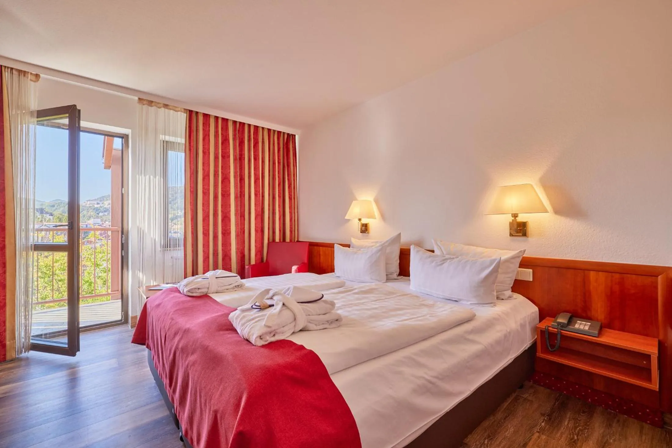Photo of the whole room, Bed in Mercure Hotel Bad Duerkheim An Den Salinen
