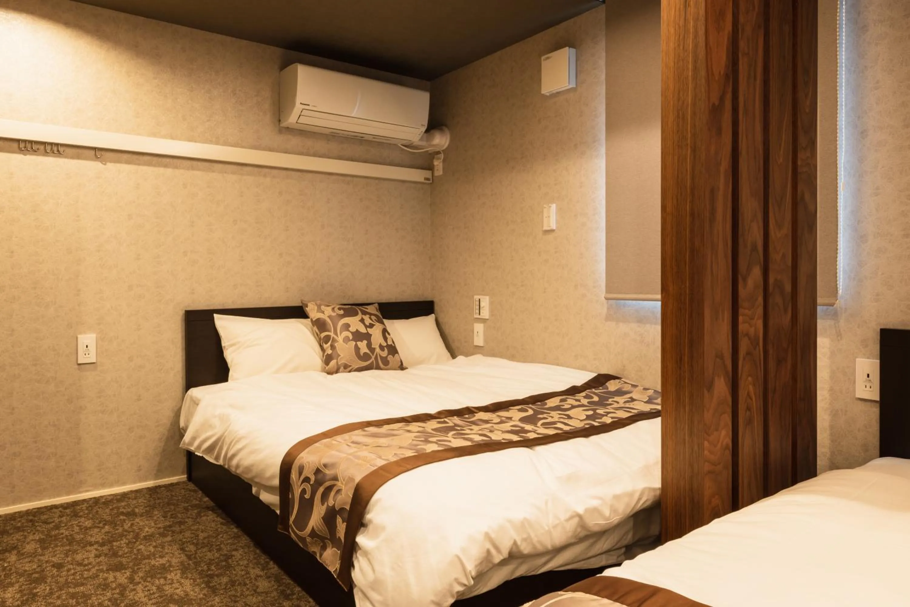 Photo of the whole room, Bed in GRAND BASE Urakami