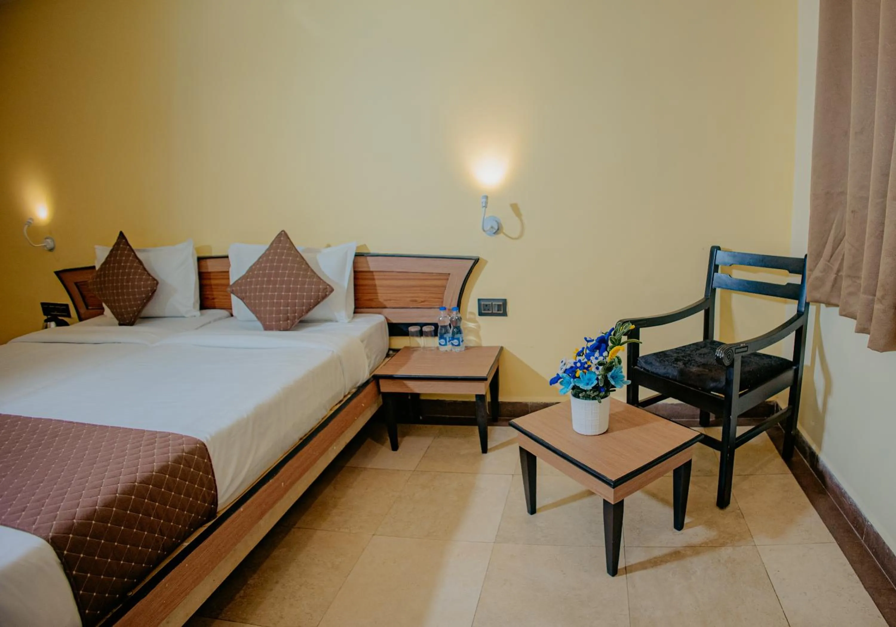 Bed in Om Shiv Hotel