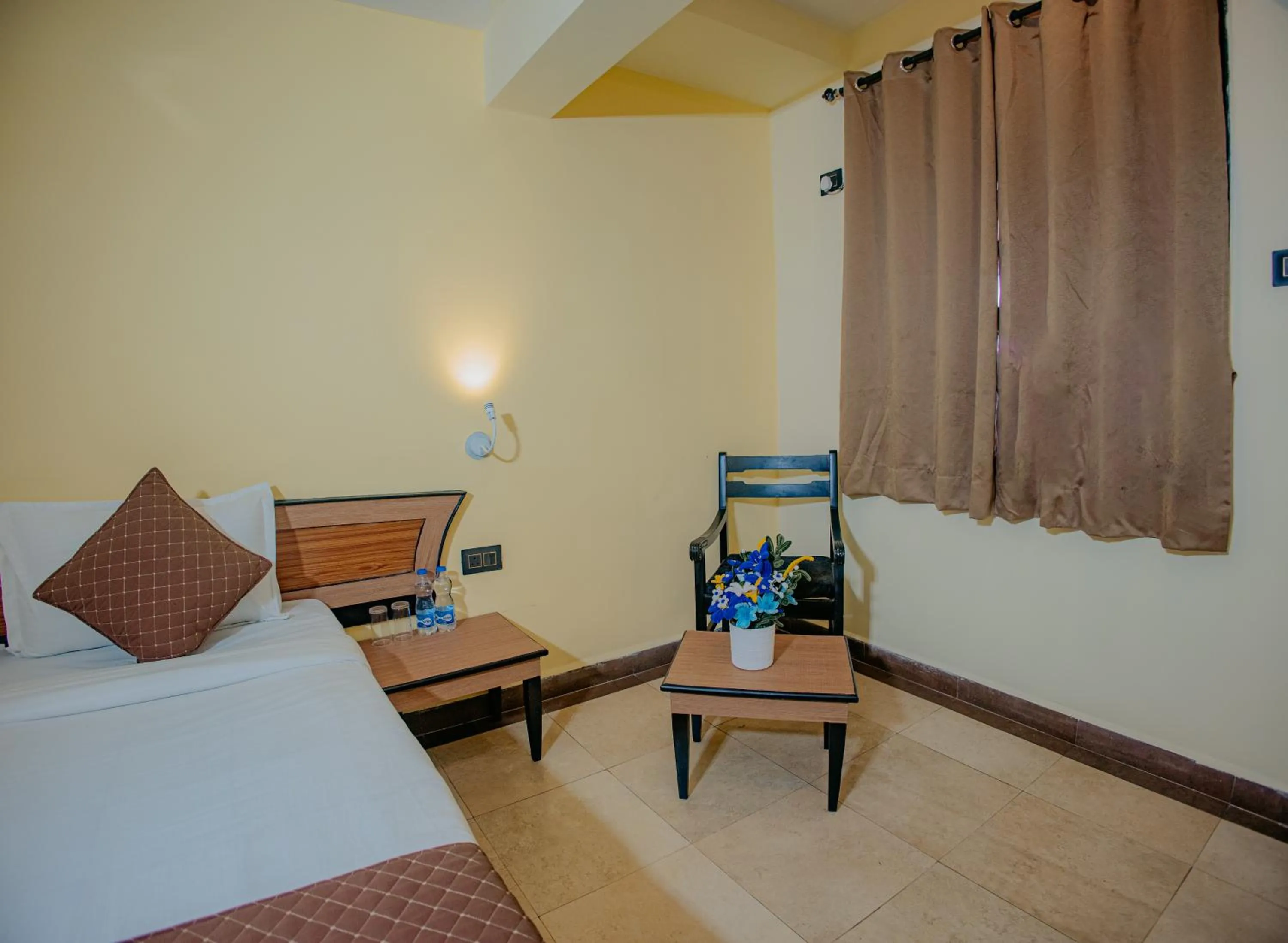 Bed in Om Shiv Hotel